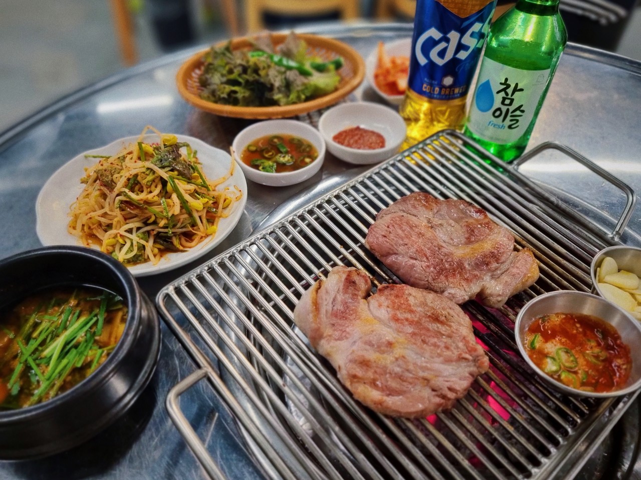 Seokgune Jumokgogi Mullae unique pork cuts grilling over hot charcoal