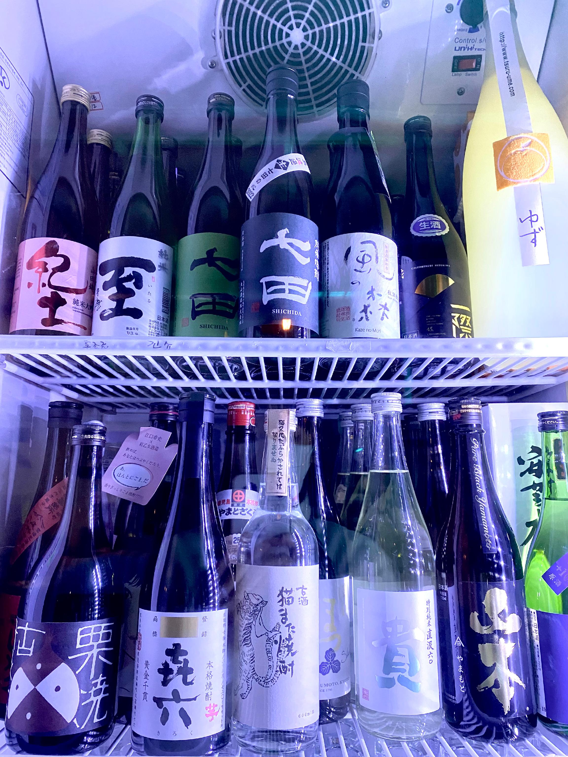 Mitasu izakaya counter with sake and small plates
