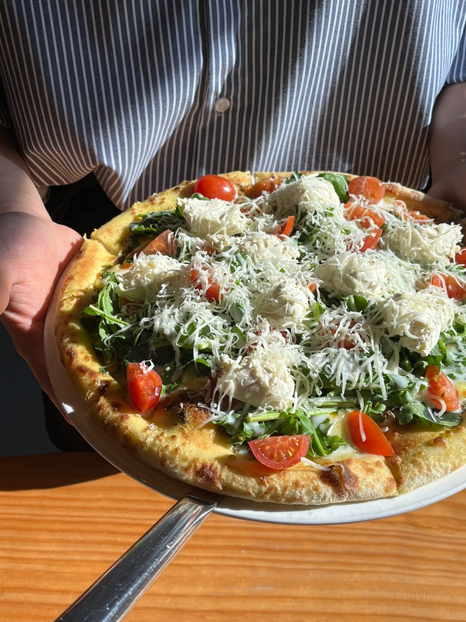 Wood-fired pizza and seasonal plates at Flowering Restaurant Gijang