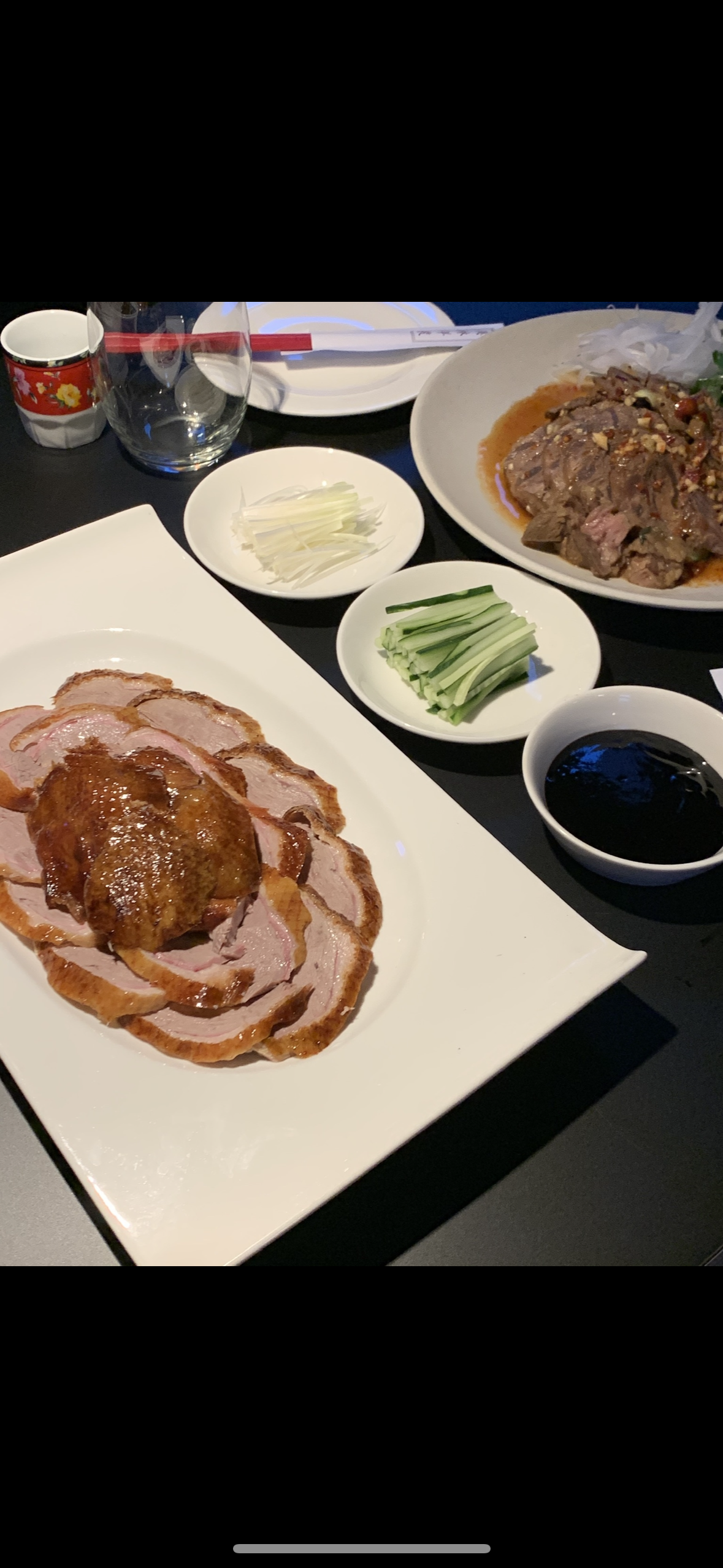 Mirim Yangjang Peking duck being carved in a Hong Kong-style dining room