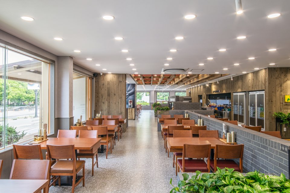 Gongsimok Hamheung cold buckwheat noodles coiled in a metal bowl