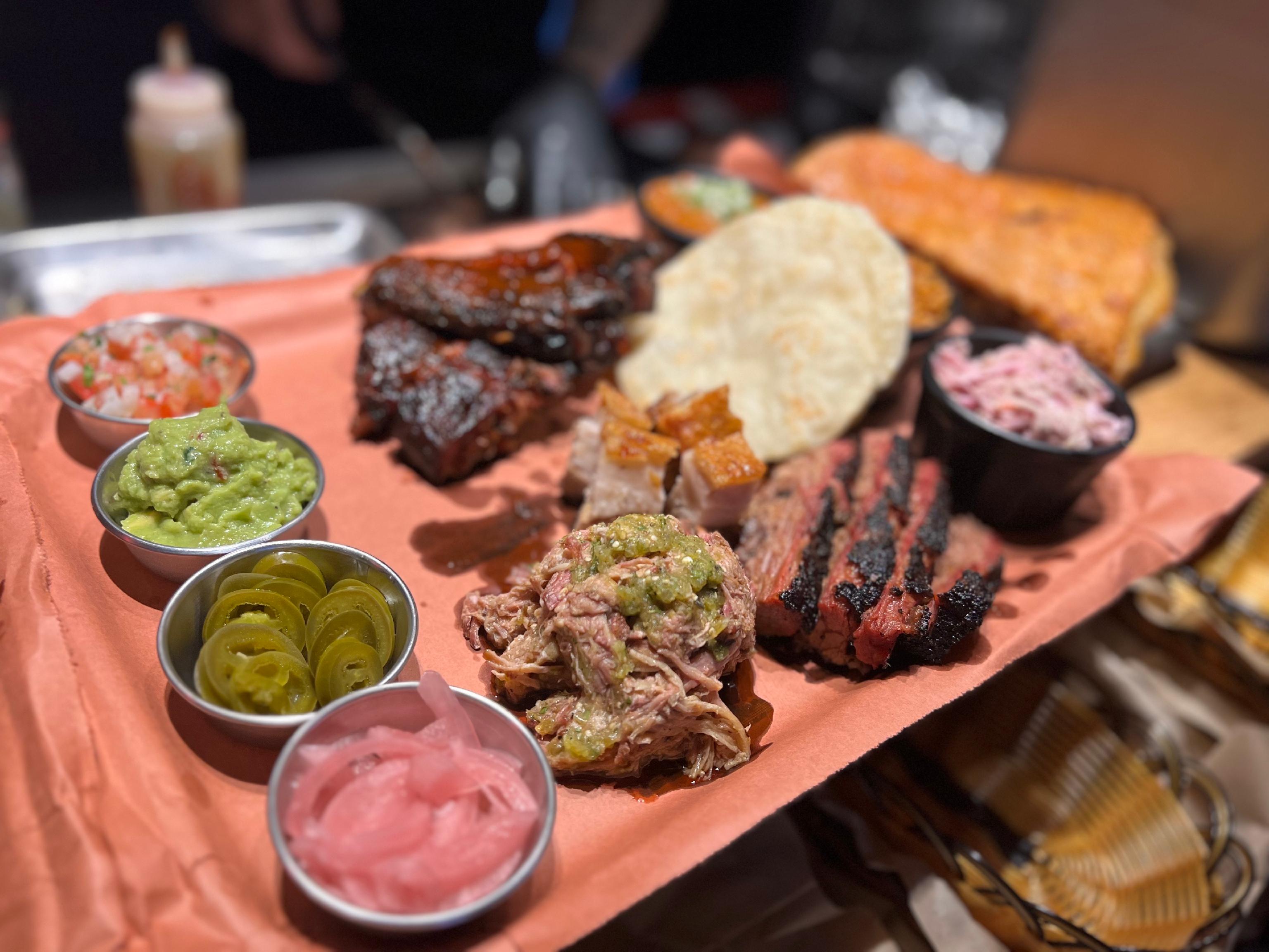Tejano Tex-Mex BBQ oak-smoked platter on Haeundae rooftop