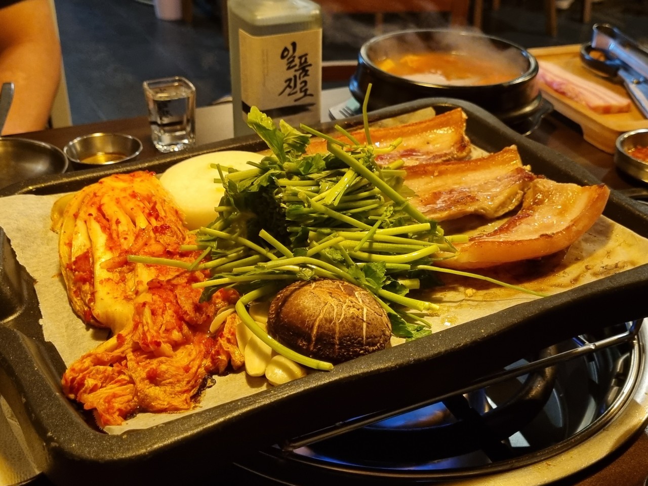 Yeouido Minari Samgyeop: pork belly and minari sizzling on the grill