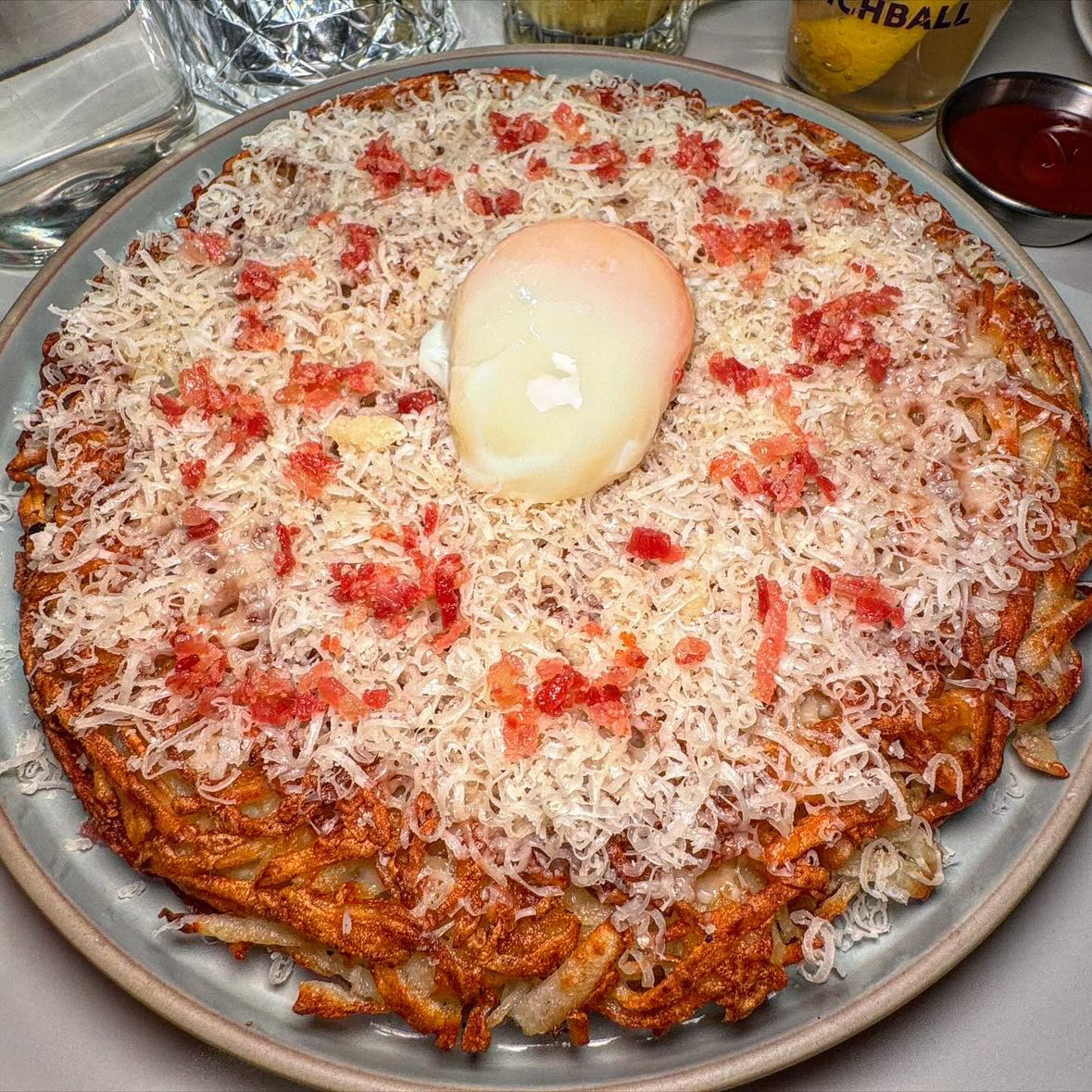 Cozy dining bar table setting at Sum's