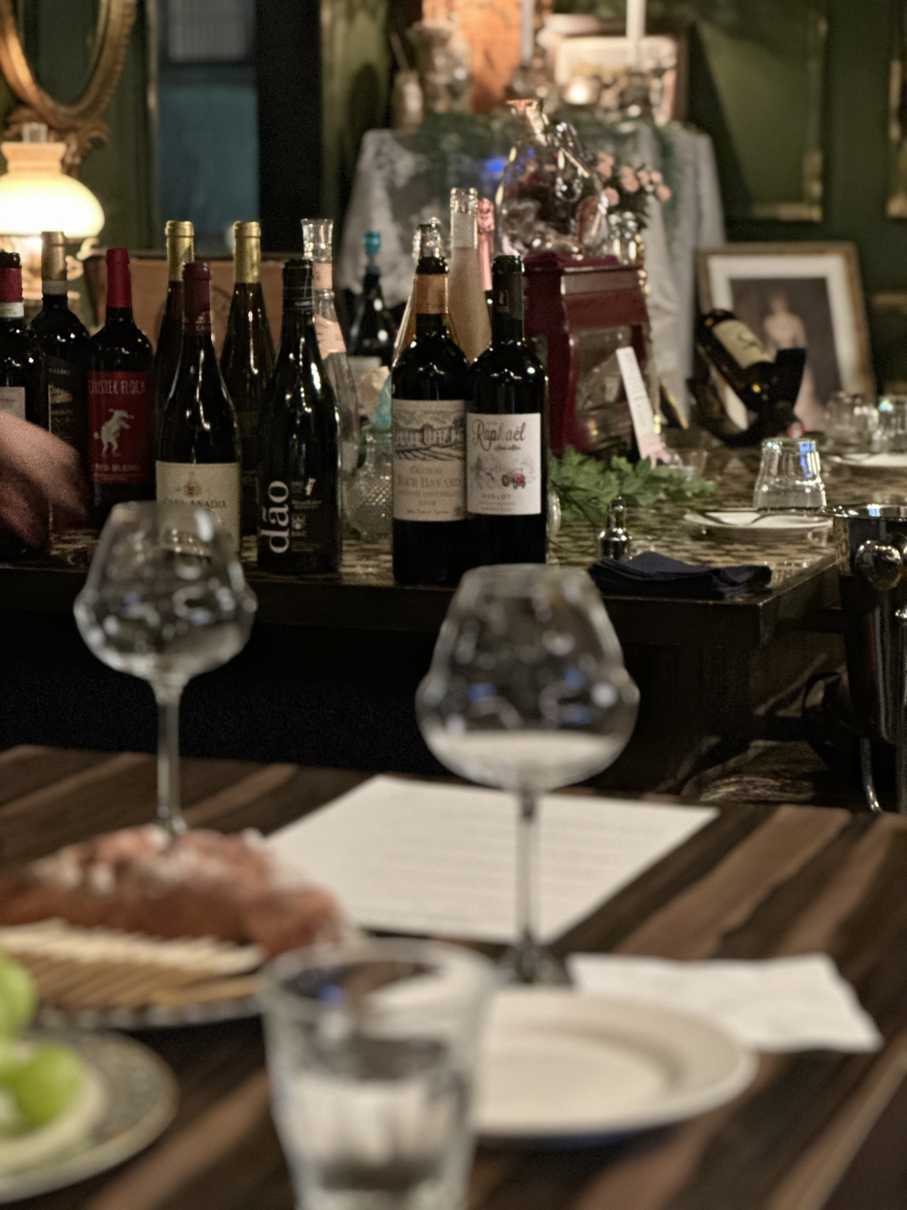 Wine O'Clock Hapjeong wall of bottles and charcuterie board