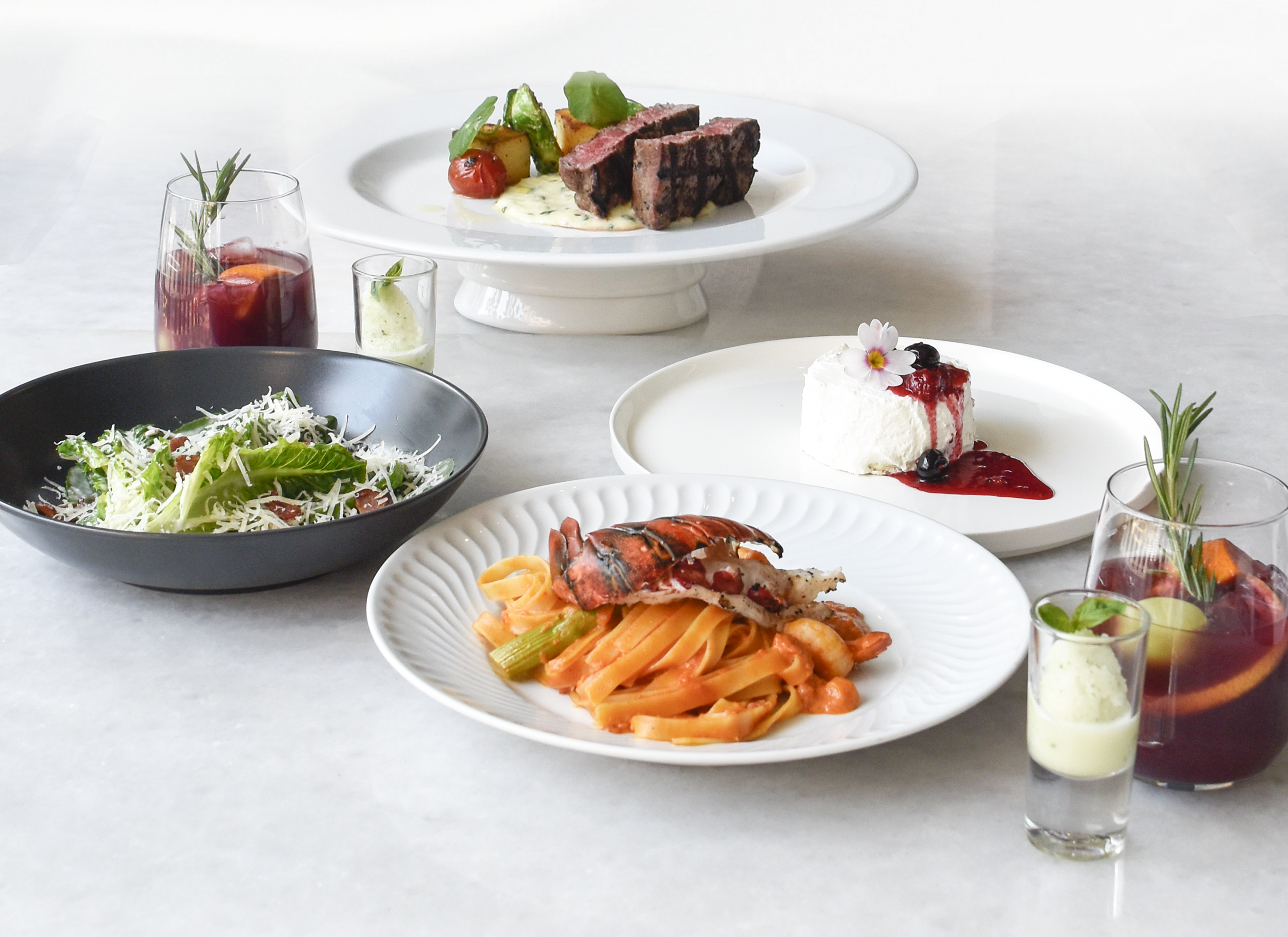 Roadville Restaurant warm wood-fired pizza and pasta table