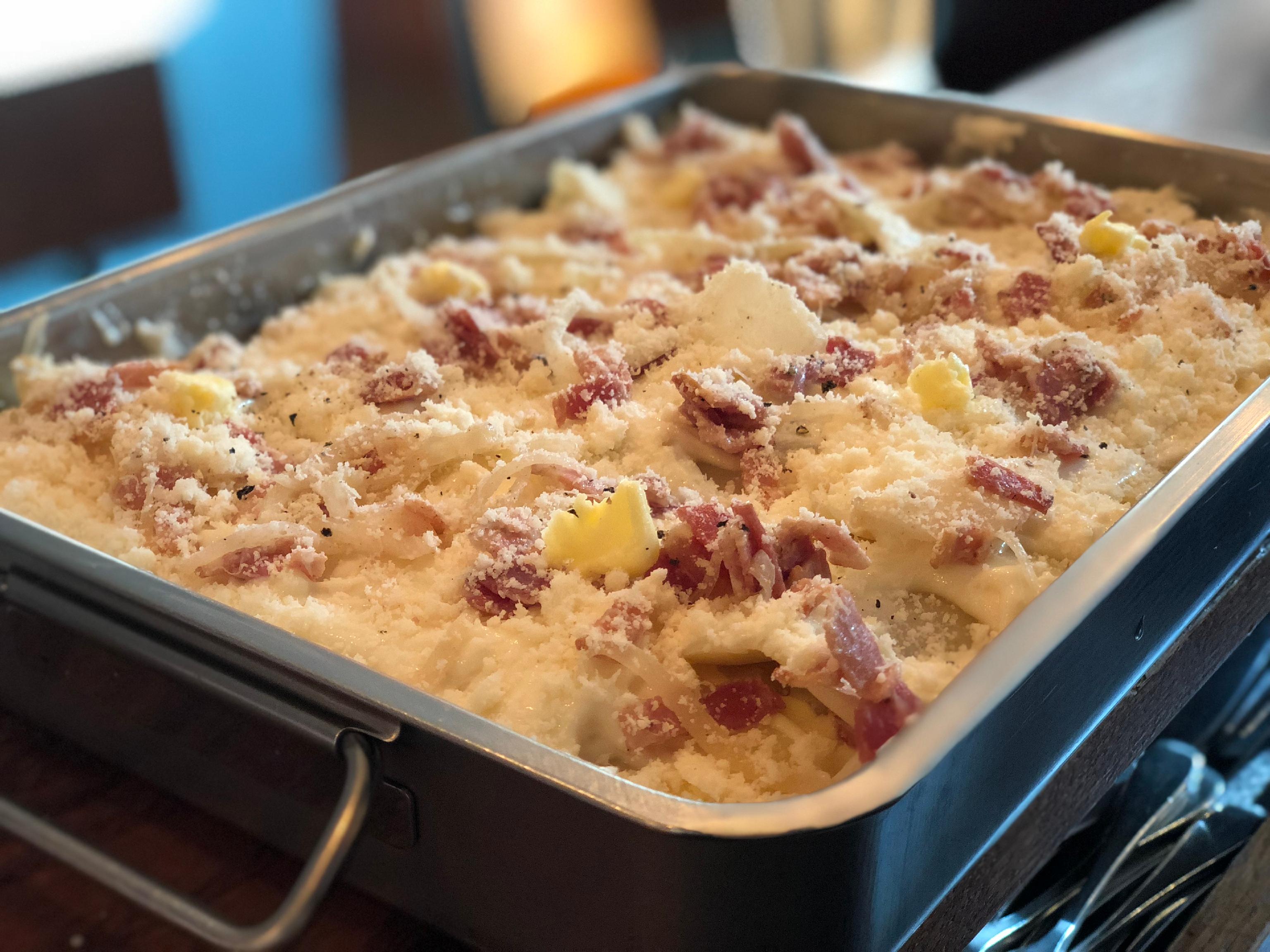 Camillo Lasagneria open kitchen with bubbling trays