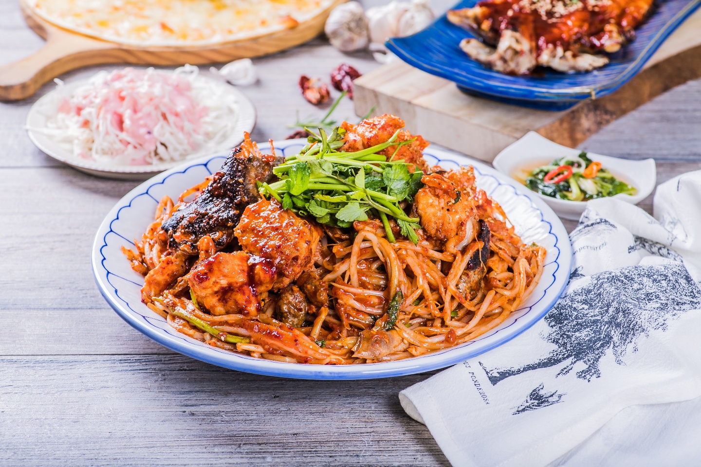 Oinja Agujjim spicy braised monkfish and stir-fry station