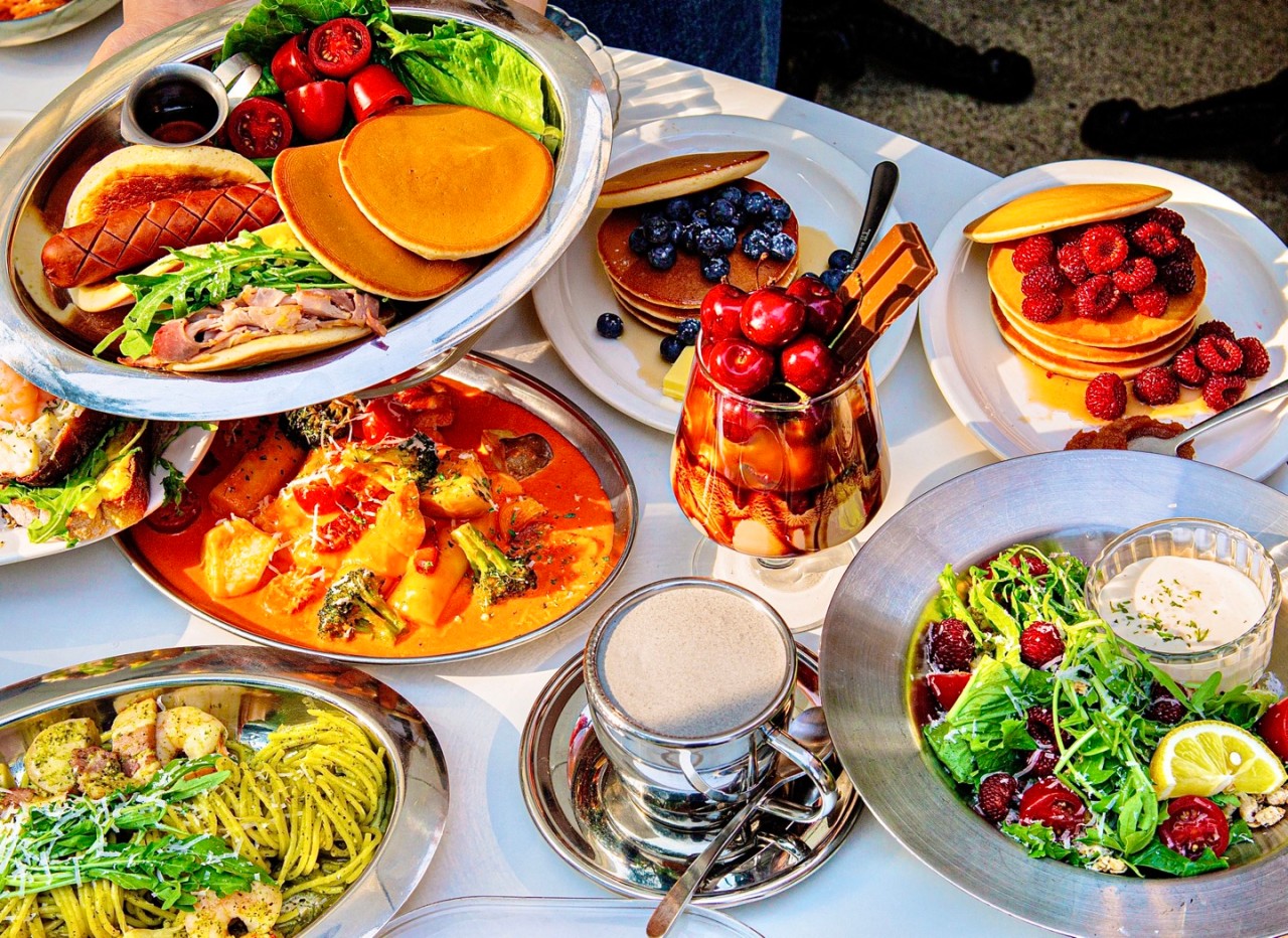 Cafe JAMJAM fluffy pancakes with seasonal fruit and cream