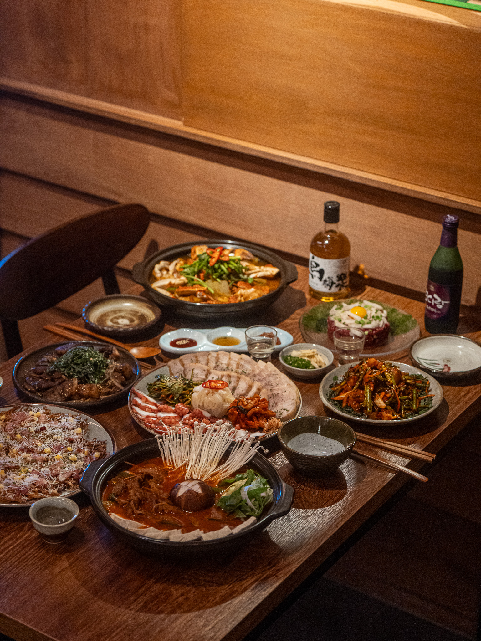 Singilli dining pub table with shareable plates and wine