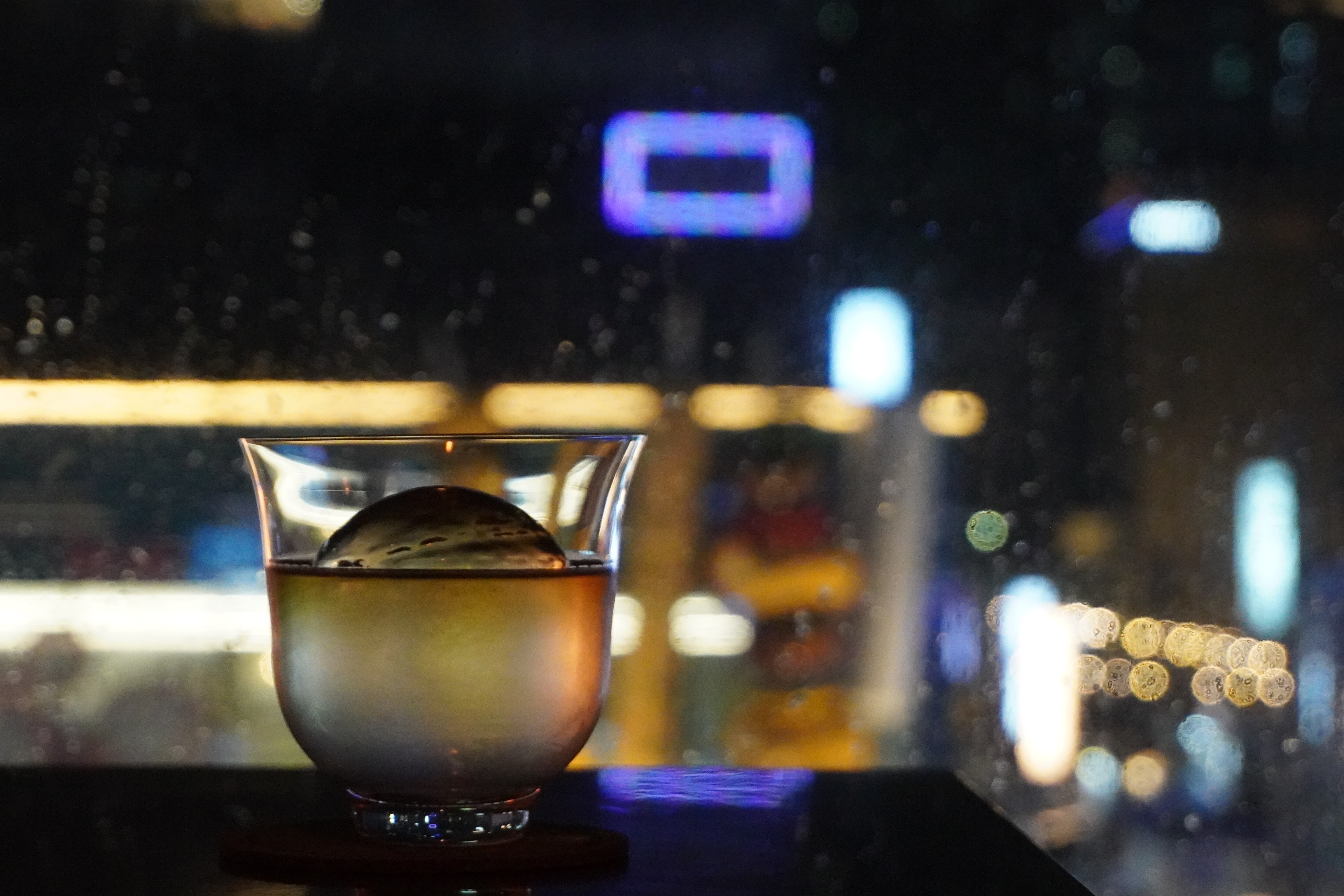 Dormer cocktail bar with window over Gunam-ro night view