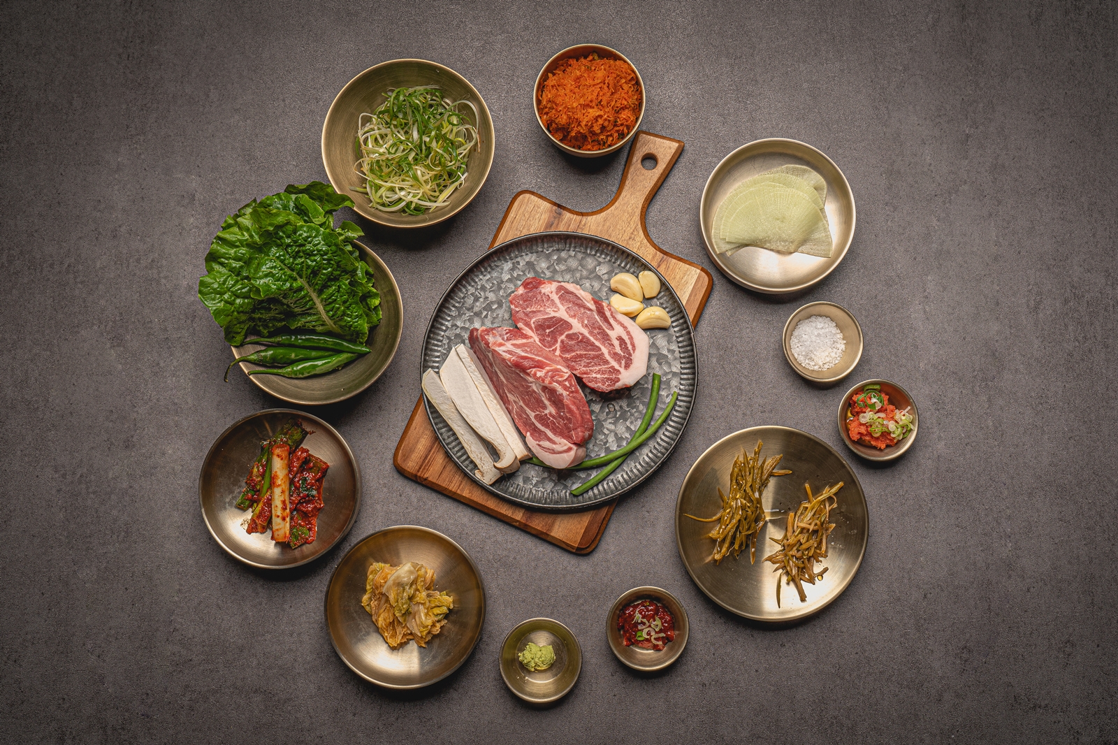 Geumil Sikdang hip dining room with seasonal sides and aged pork