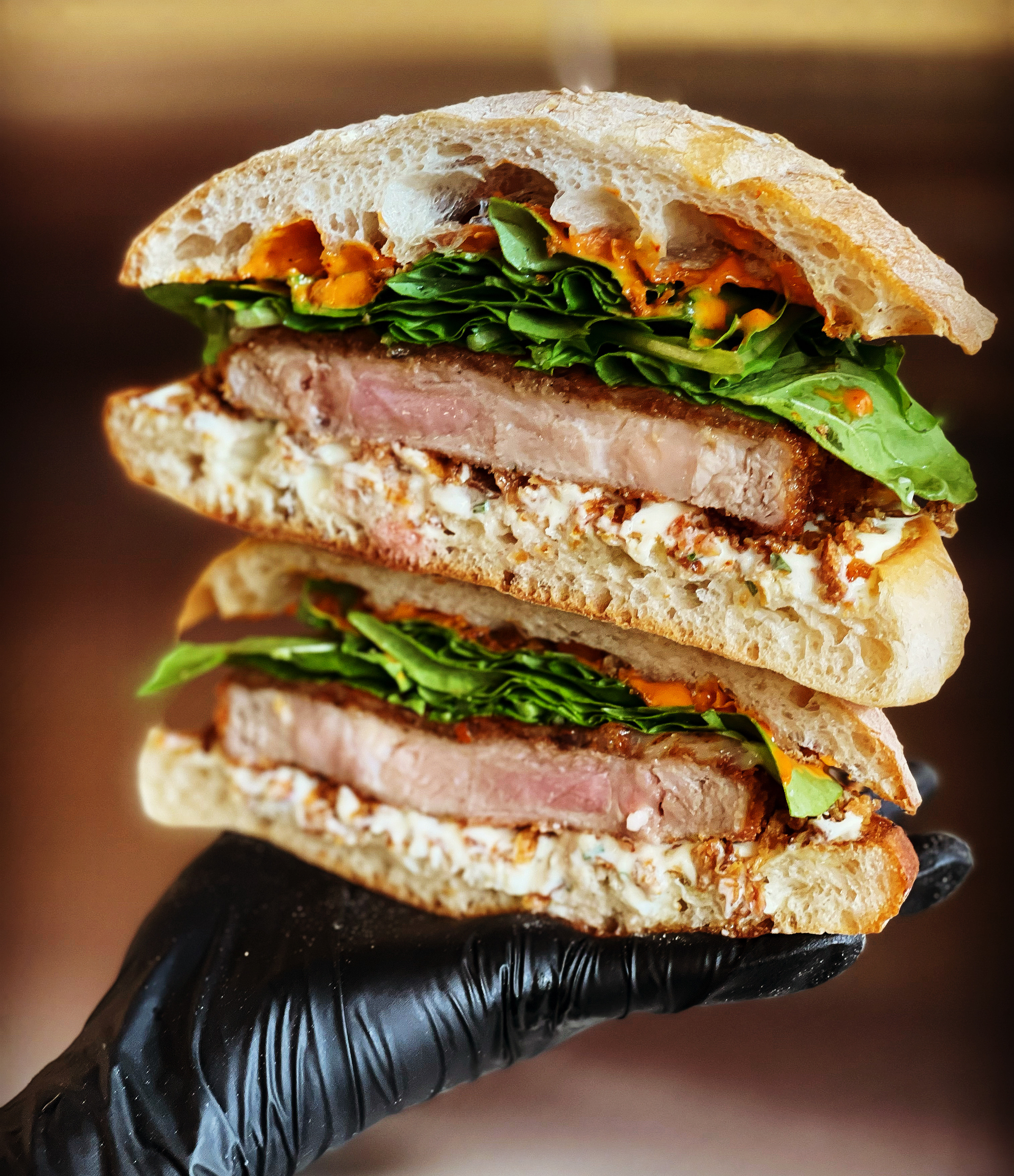 SANDOS Seongsu New York-style katsu sando with torched provolone and arugula