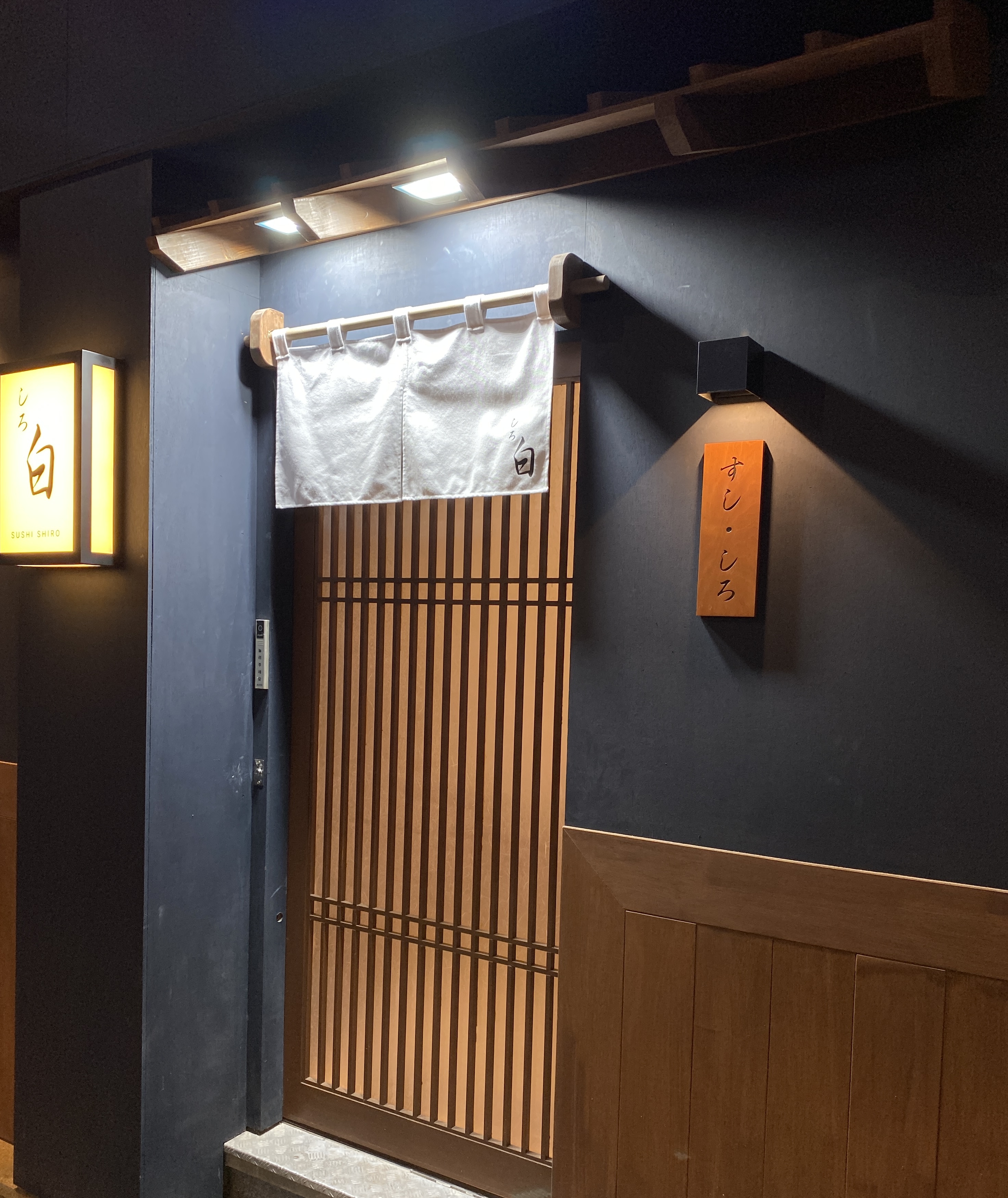 Sushi Shiro & Sushi-sim takai omakase nigiri on wooden board