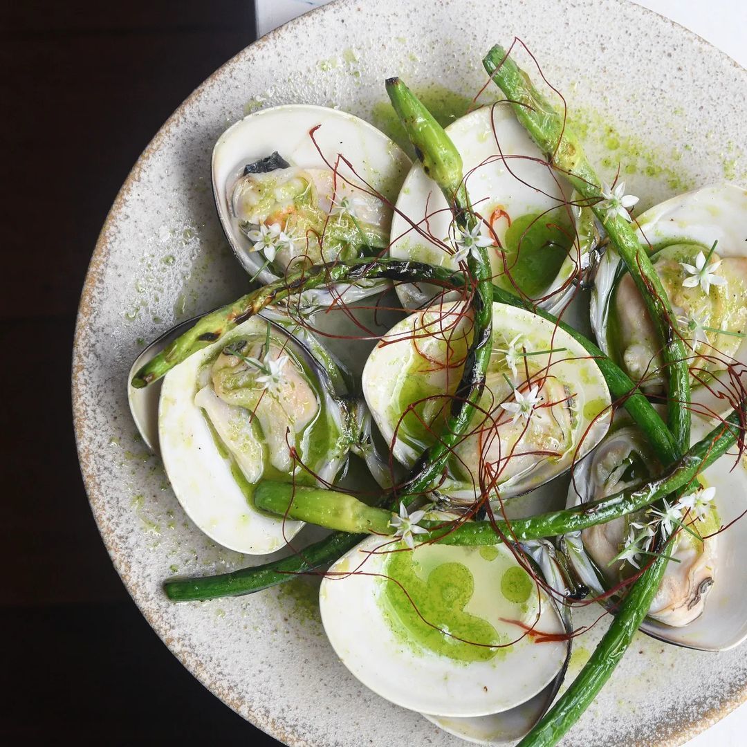 EL PLATO Spanish classics on rustic table with warm lighting