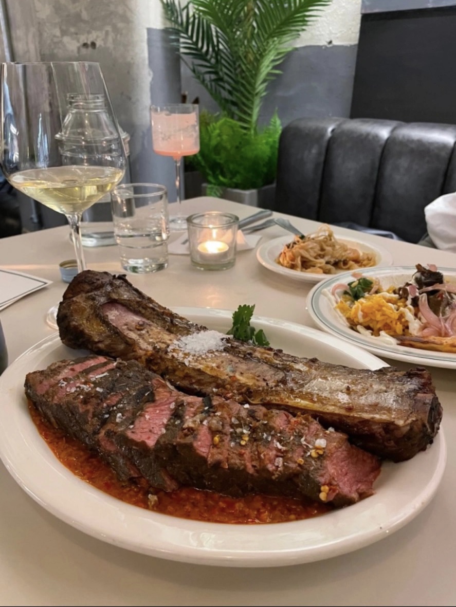 Drunk Tank Pink dining bar cocktails, pad thai, and grilled meats