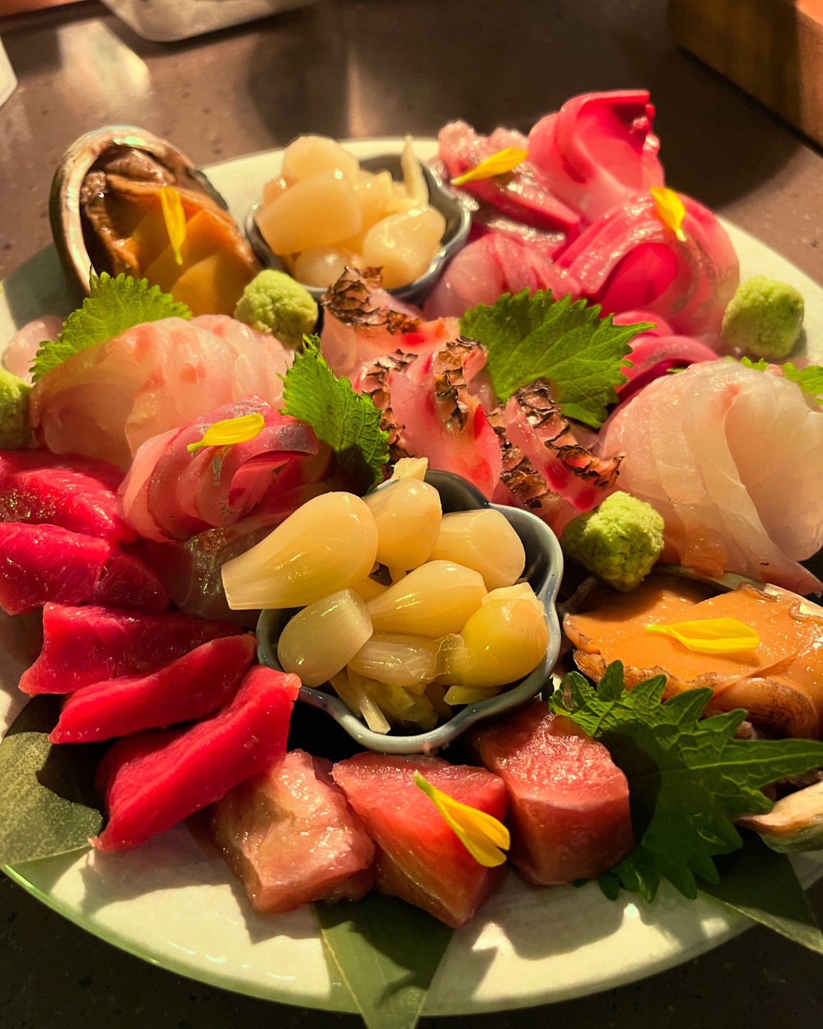 AKUA izakaya plates with wine and highballs