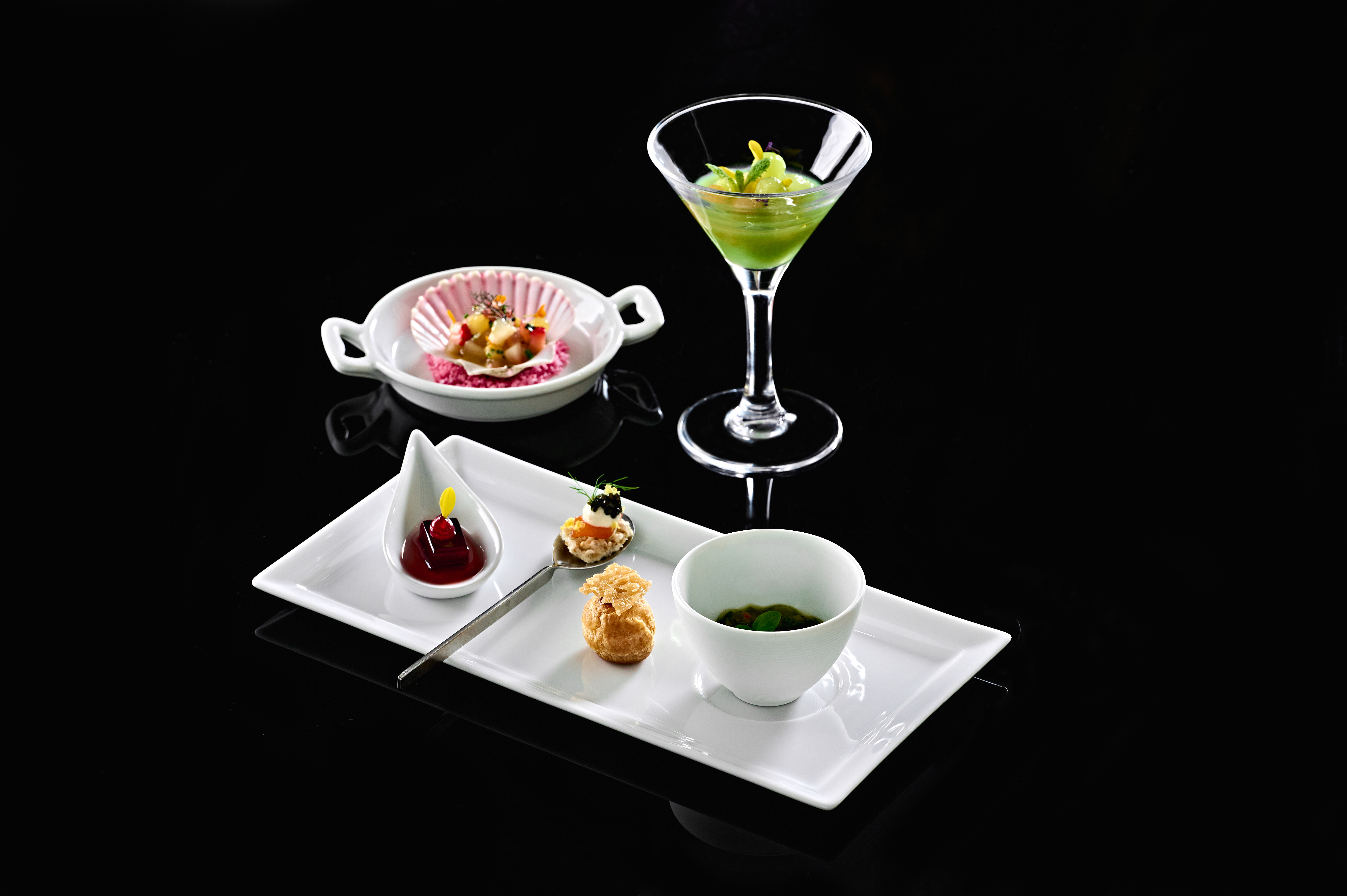 Pierre Gagnaire Seoul dining room with skyline view and plated modern French cuisine