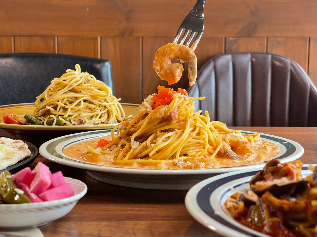 Sojung cozy interior with pasta and pizza for family lunch