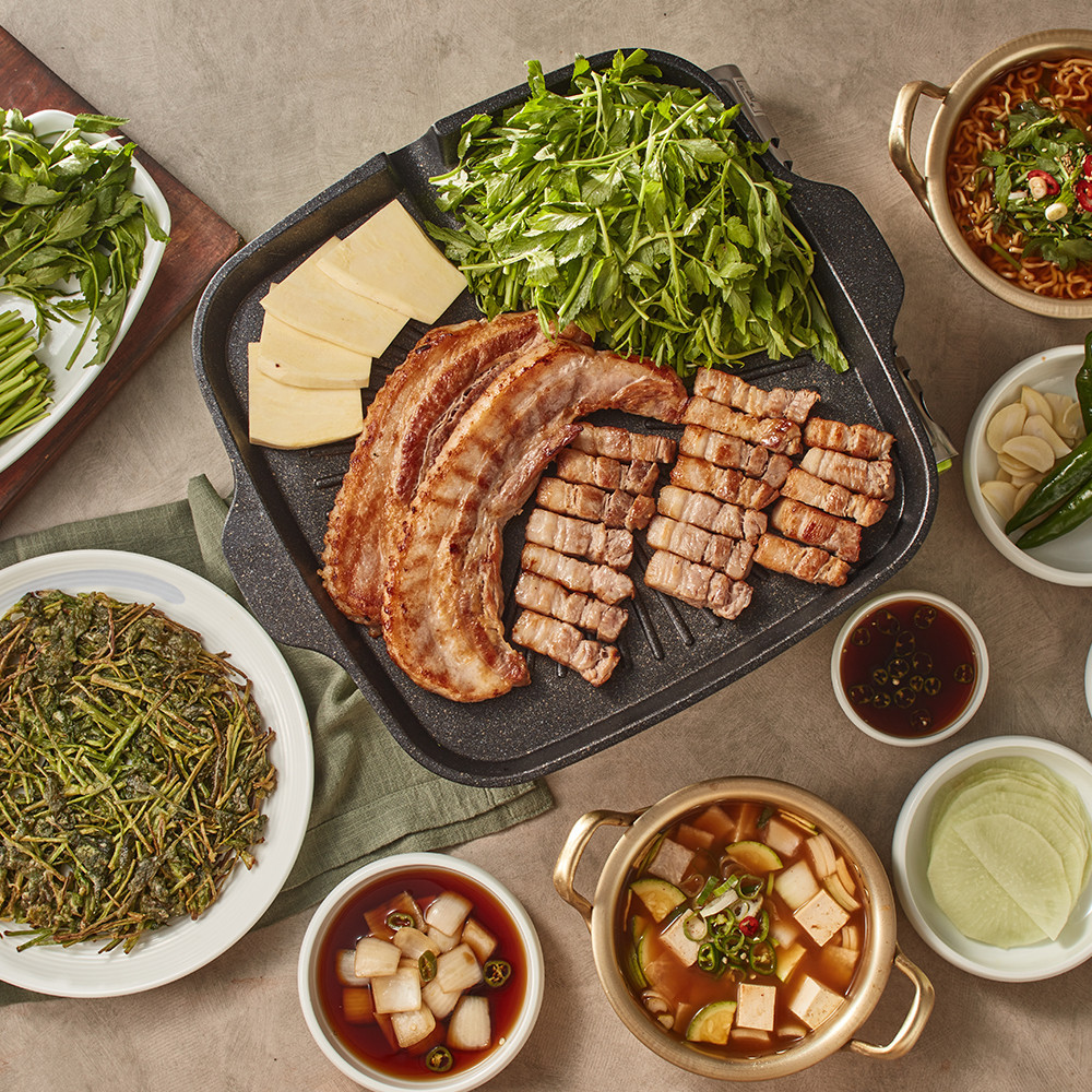 Cheongdo Minari Restaurant Hapjeong table with minari, pork belly and duck