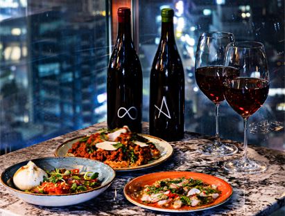 Rooftop Kloud skyline view with cocktails in Gangnam