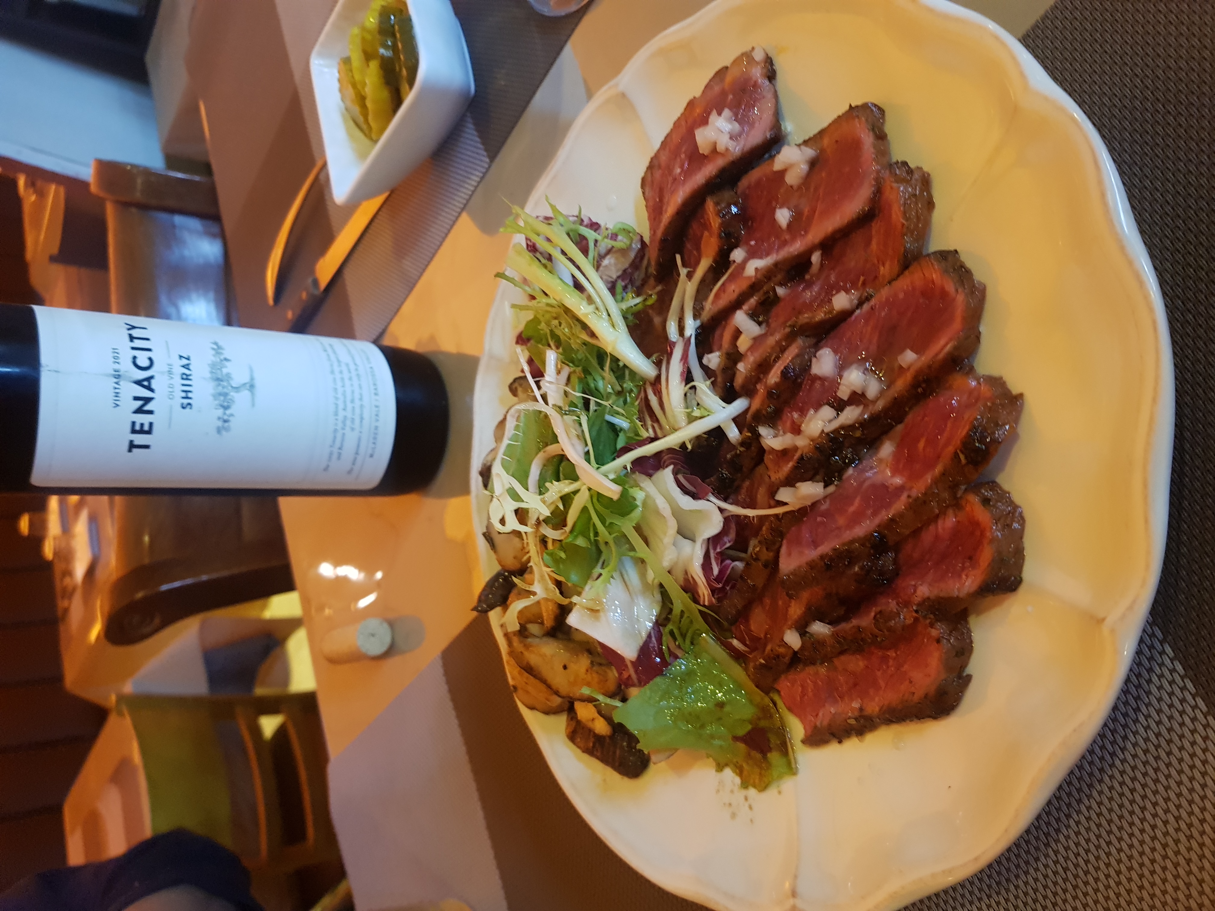 Songdo Bistro cozy wine bistro table with plates