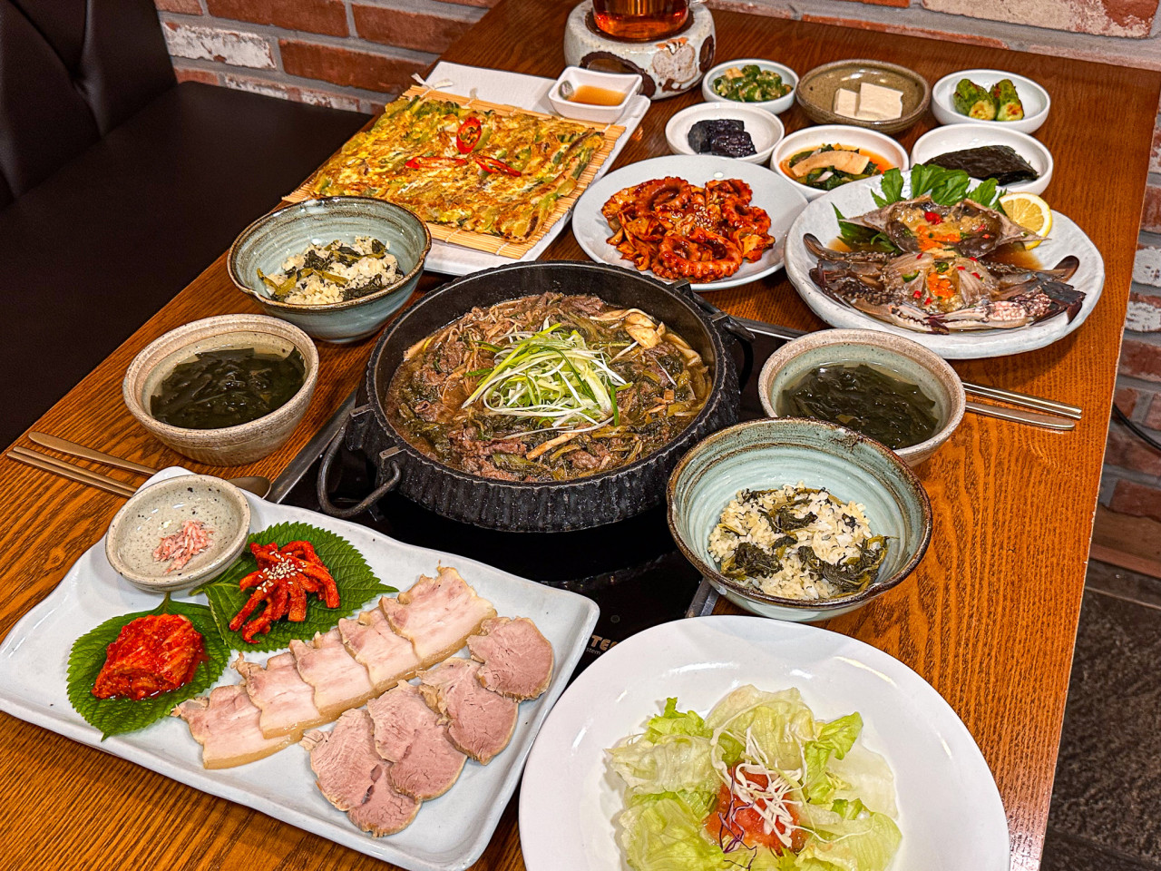 Sirae Hyang hanjeongsik table with siraegi dishes and clear broth