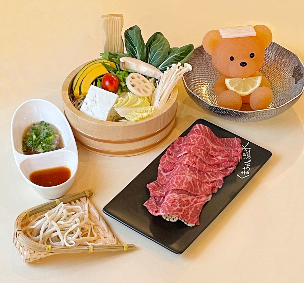 Bear-shaped broth and shabu-shabu setup at Kumachan Onsen Seongsu