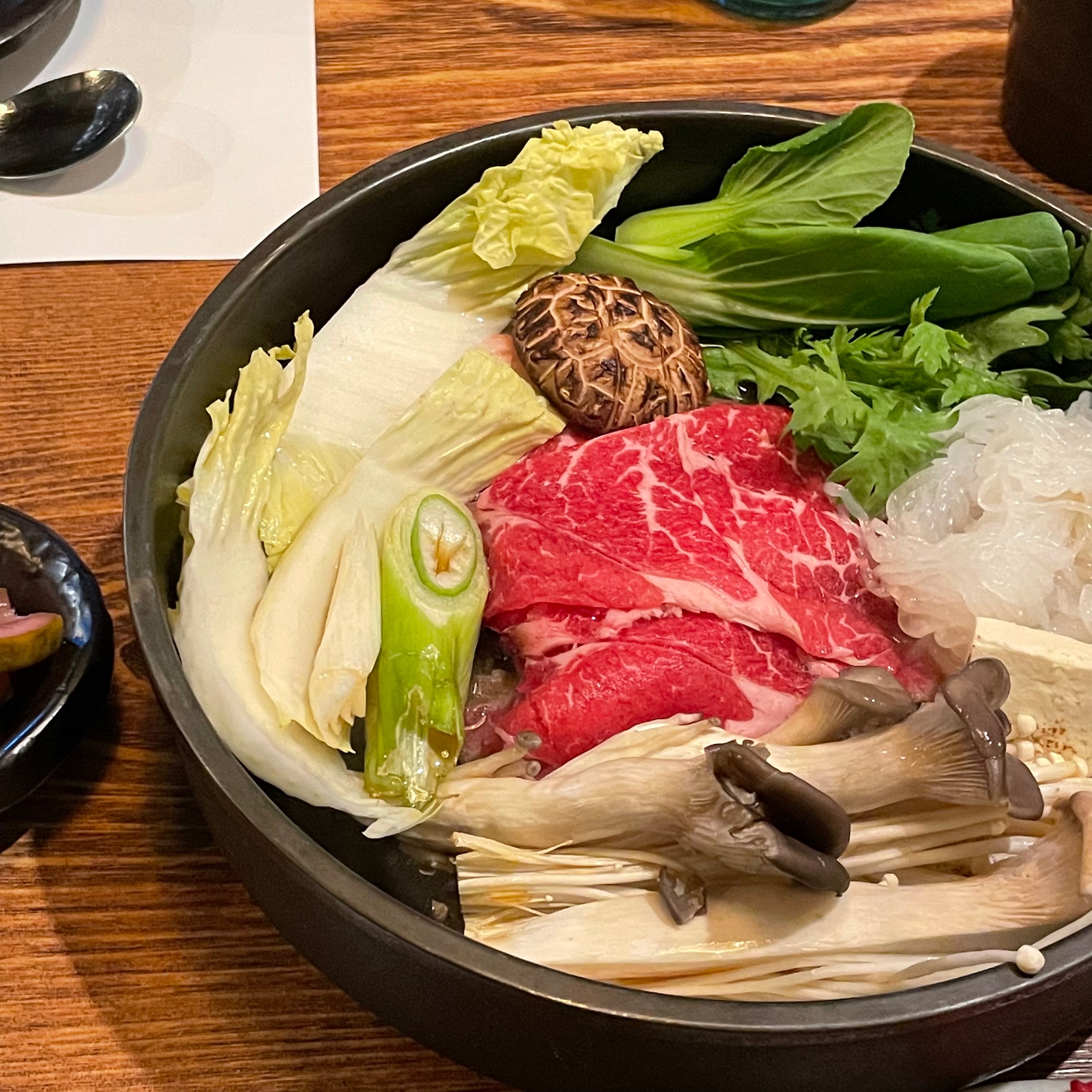 Hannaembi sukiyaki and shabu sets with eggs and vegetables