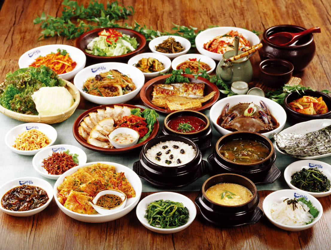 Sandeulhae Songpa wide Korean spread with banchan and grilled fish