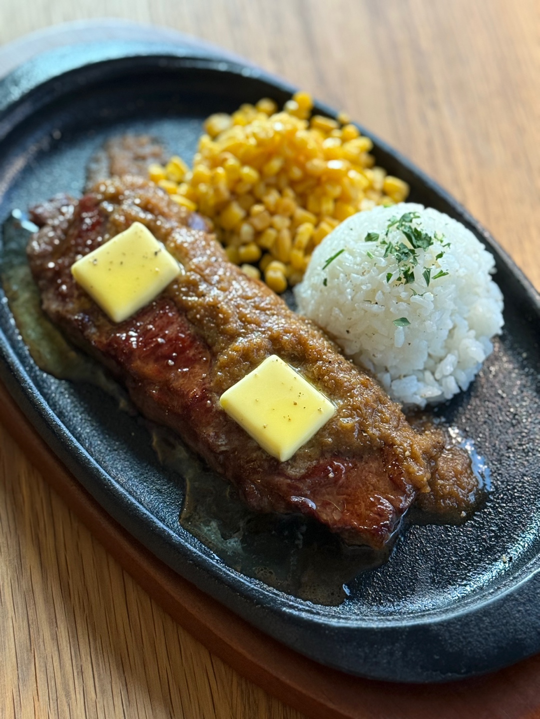 Window-side table at KOMVAAK with Seoullo skyline