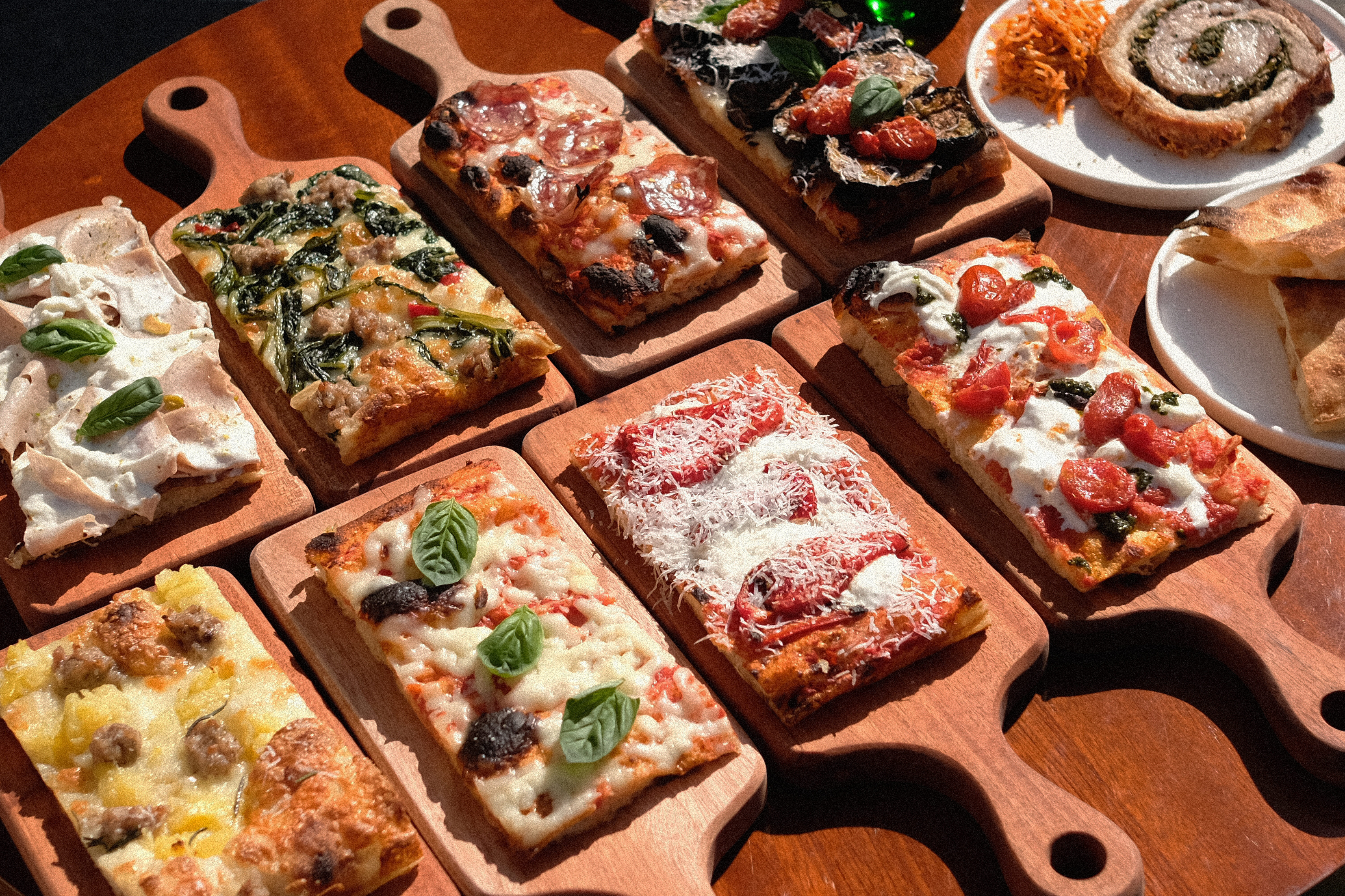 Lamotta Roman-style pizza on terrace with beer