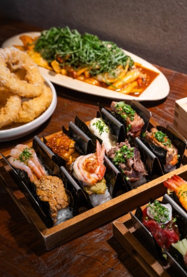 Duckdive NY-style maki lineup in cozy bar setting
