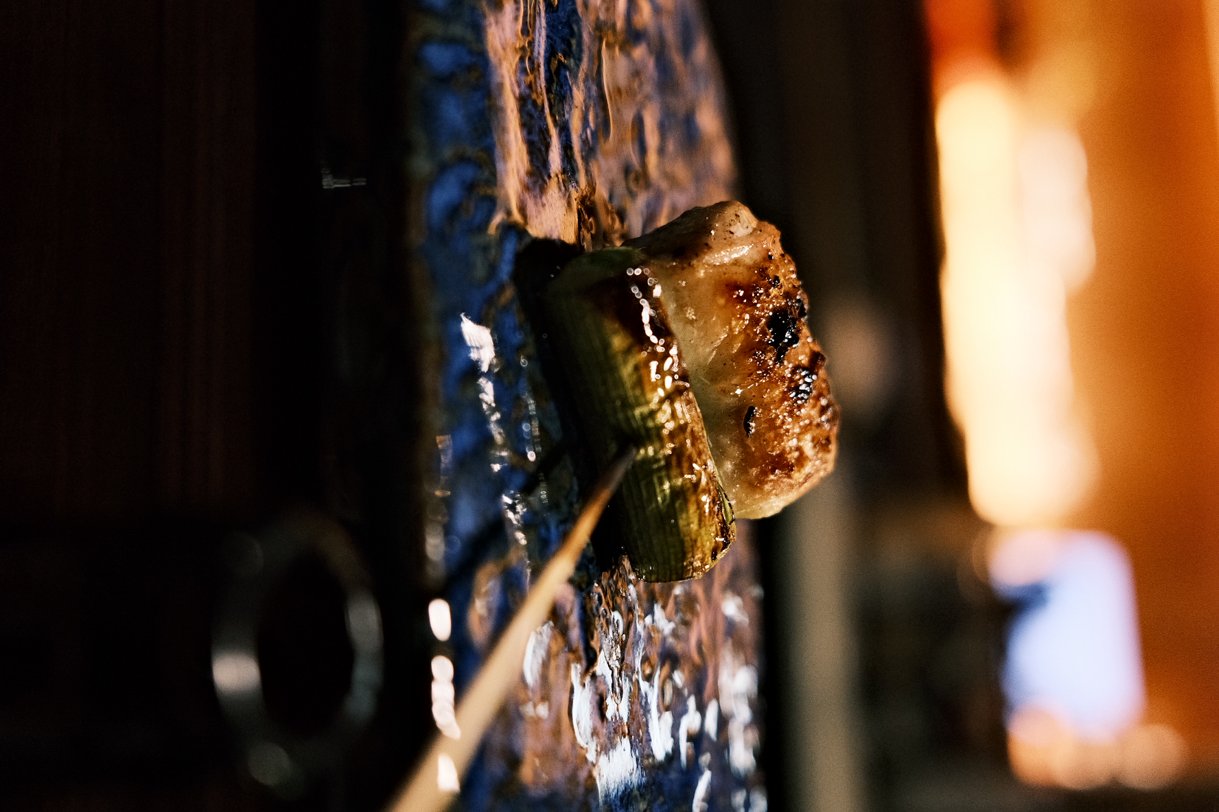 Chul-Ipgu yakitori skewers sizzling over charcoal