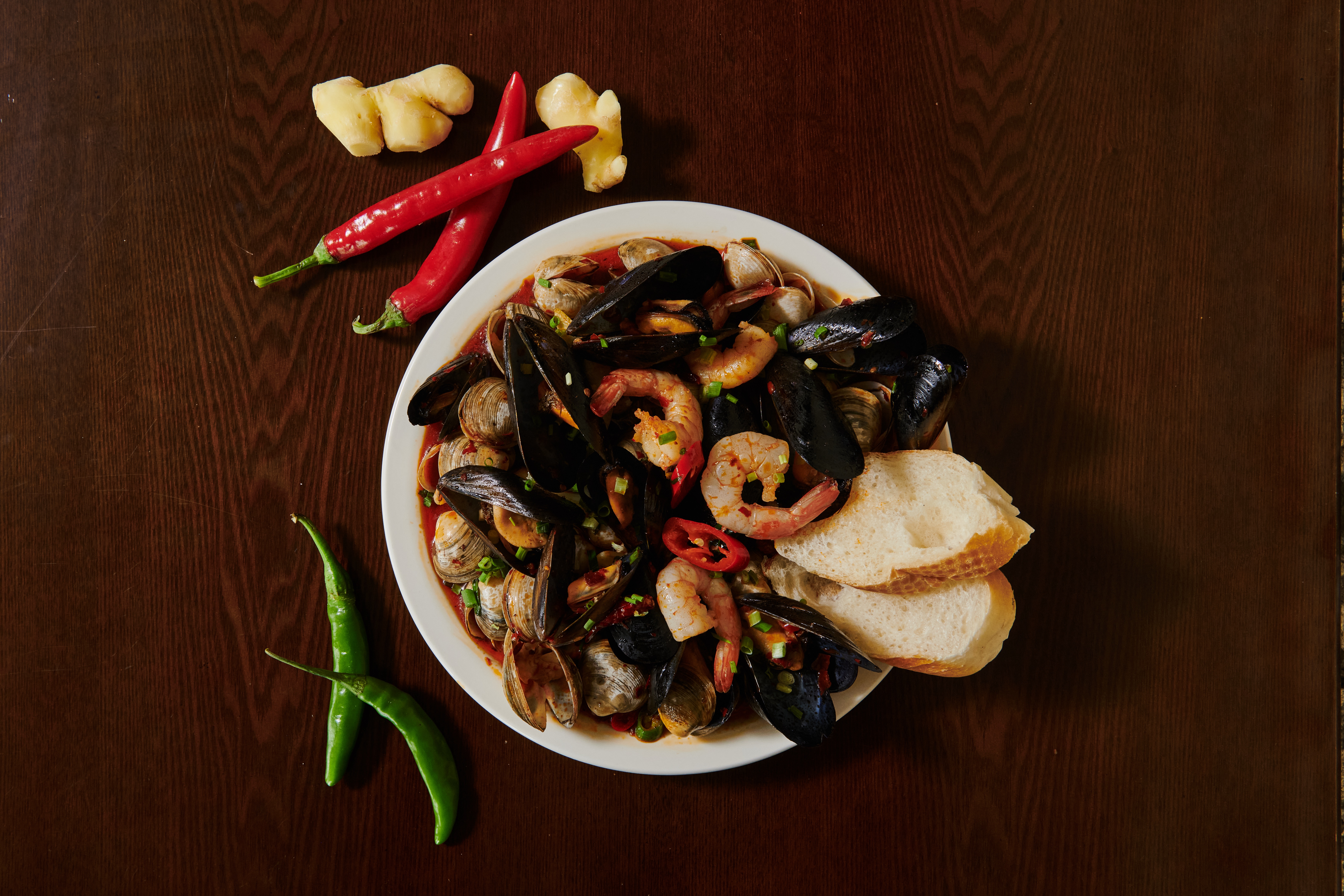 Kamar spacious dining bar with Itaewon view at dusk