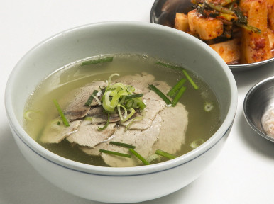 Gwanghwamun Rice Soup steaming pork rice soup and condiments