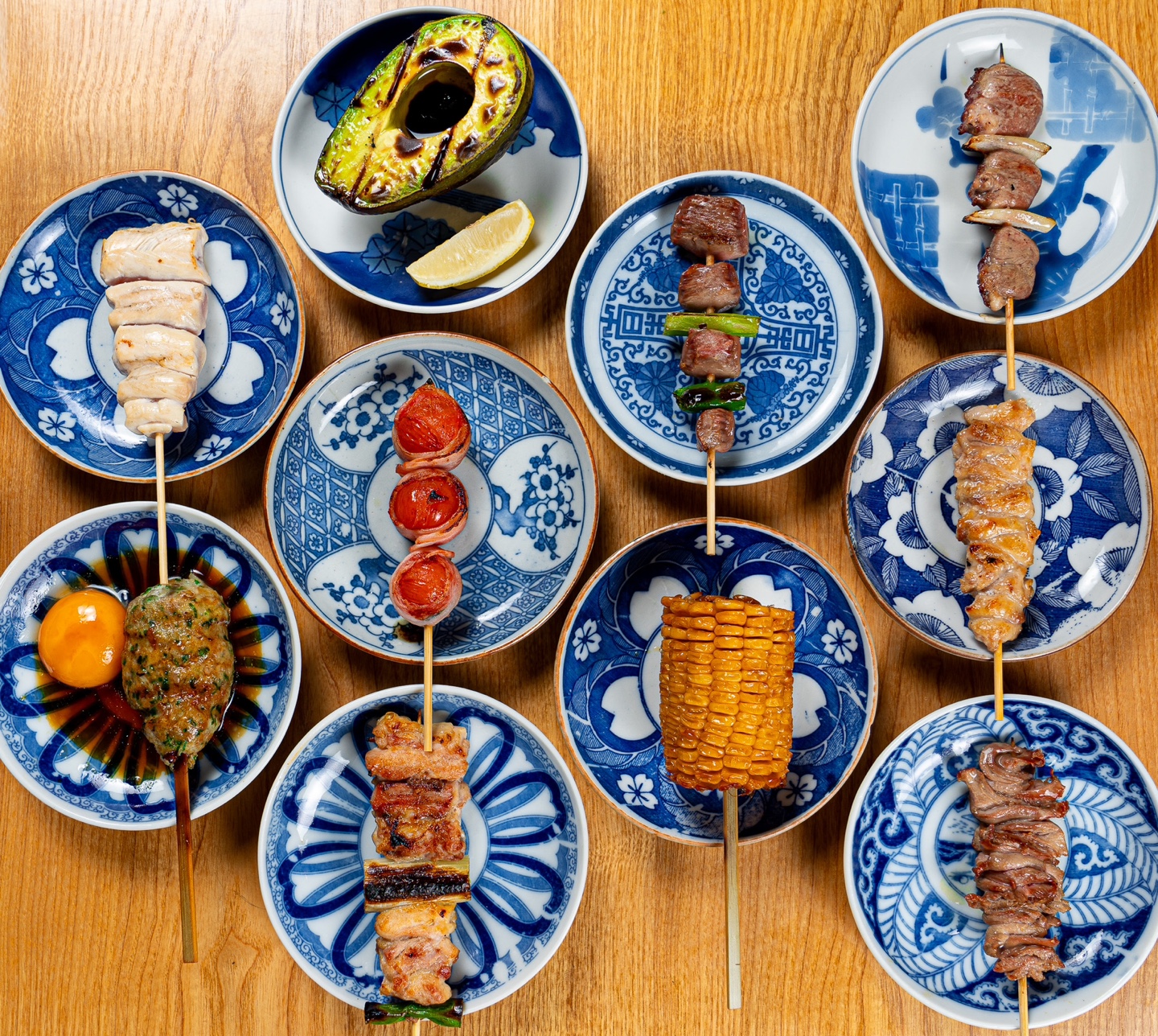 Yakitori Yoisa bar counter with skewers on binchotan