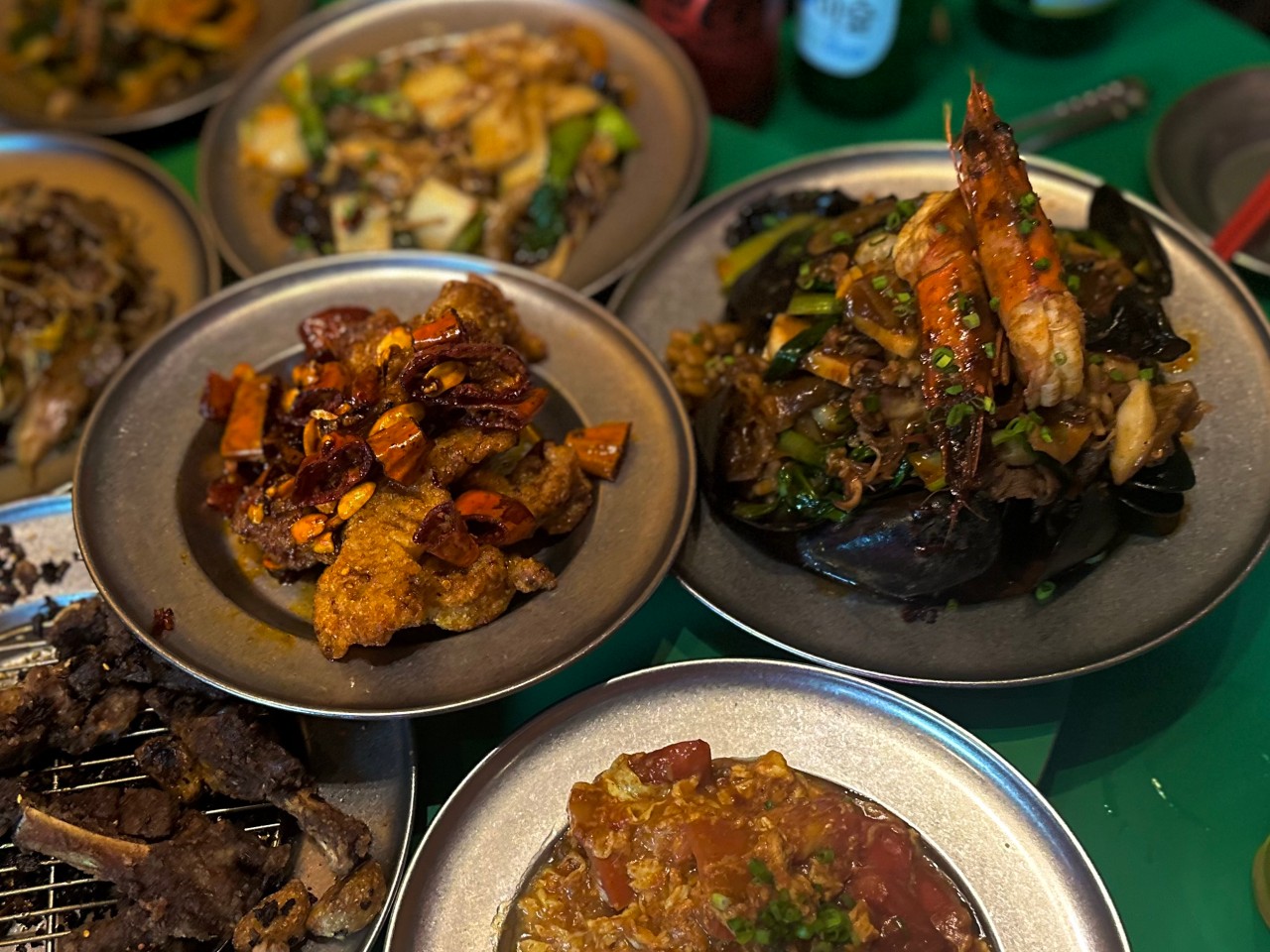 Seonmin Sindang neon lit bar with wok dishes