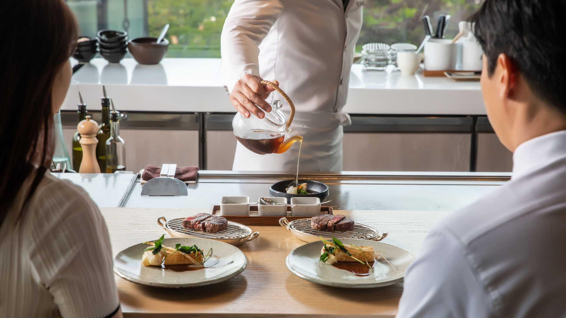 Grand Hyatt Seoul Teppan chef searing seafood and steak