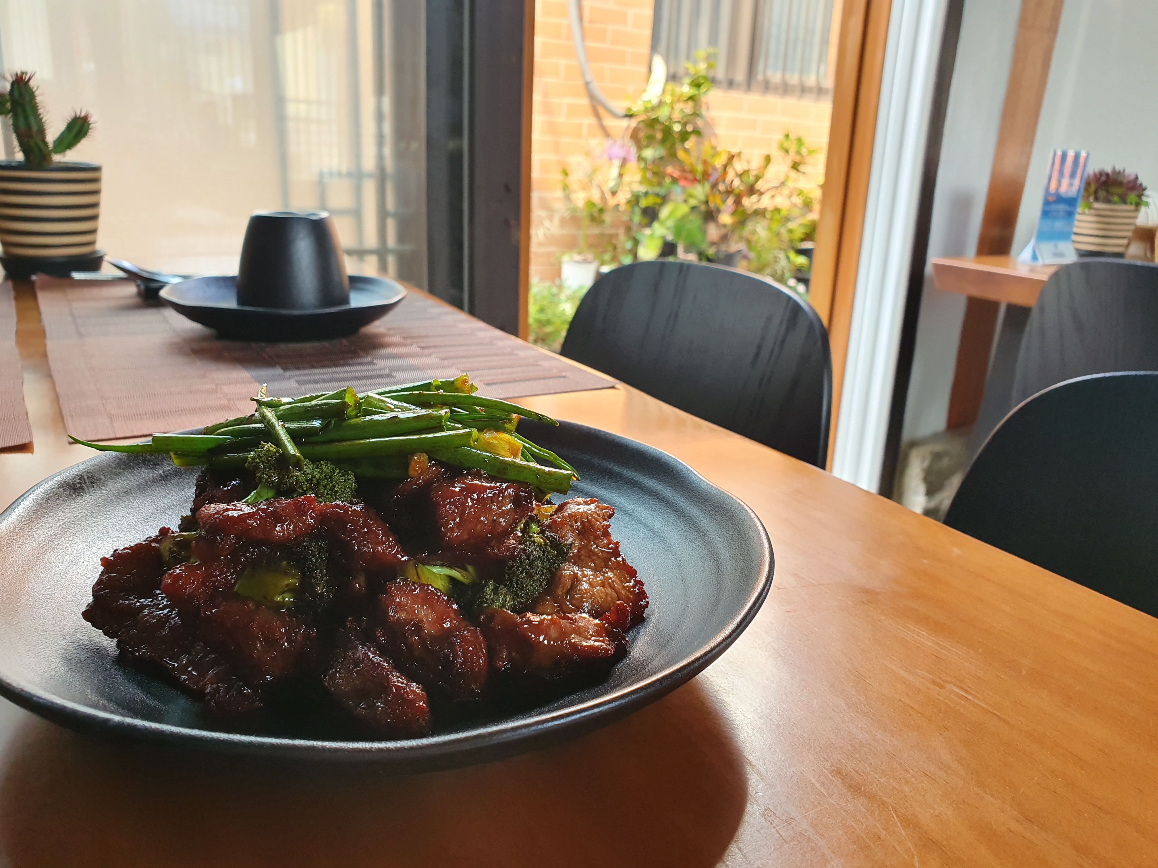 American Chinese CHIN chandeliered dining room and large-portion courses