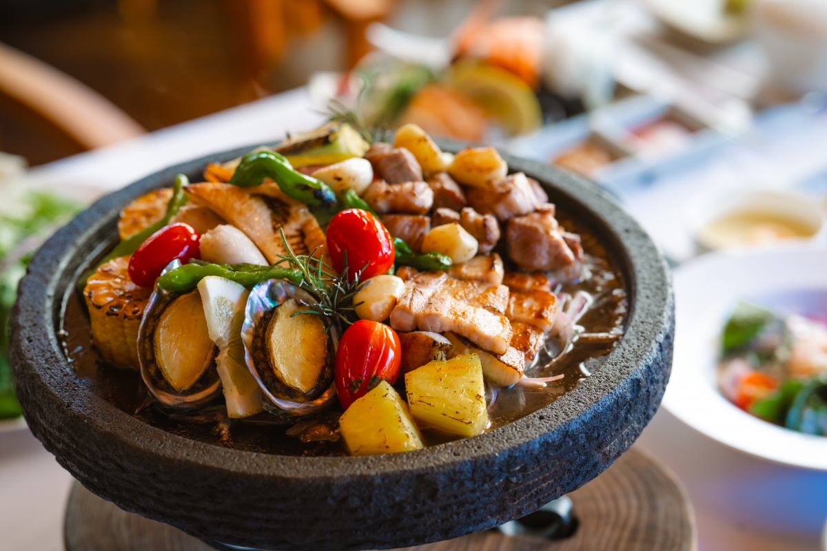 Seaes Dining ocean view terrace with modern Jeju course