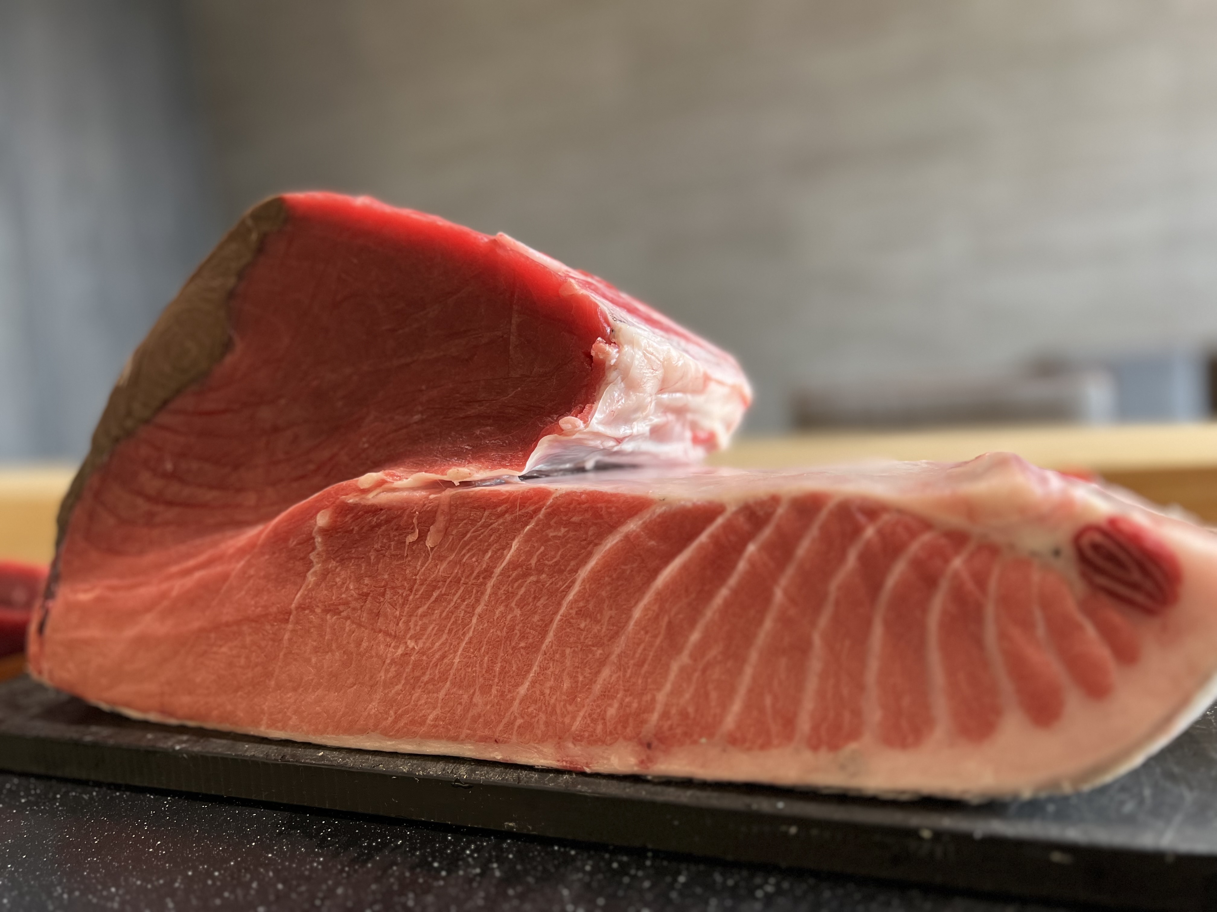 Sushi Miura chef plating omakase at Marine City