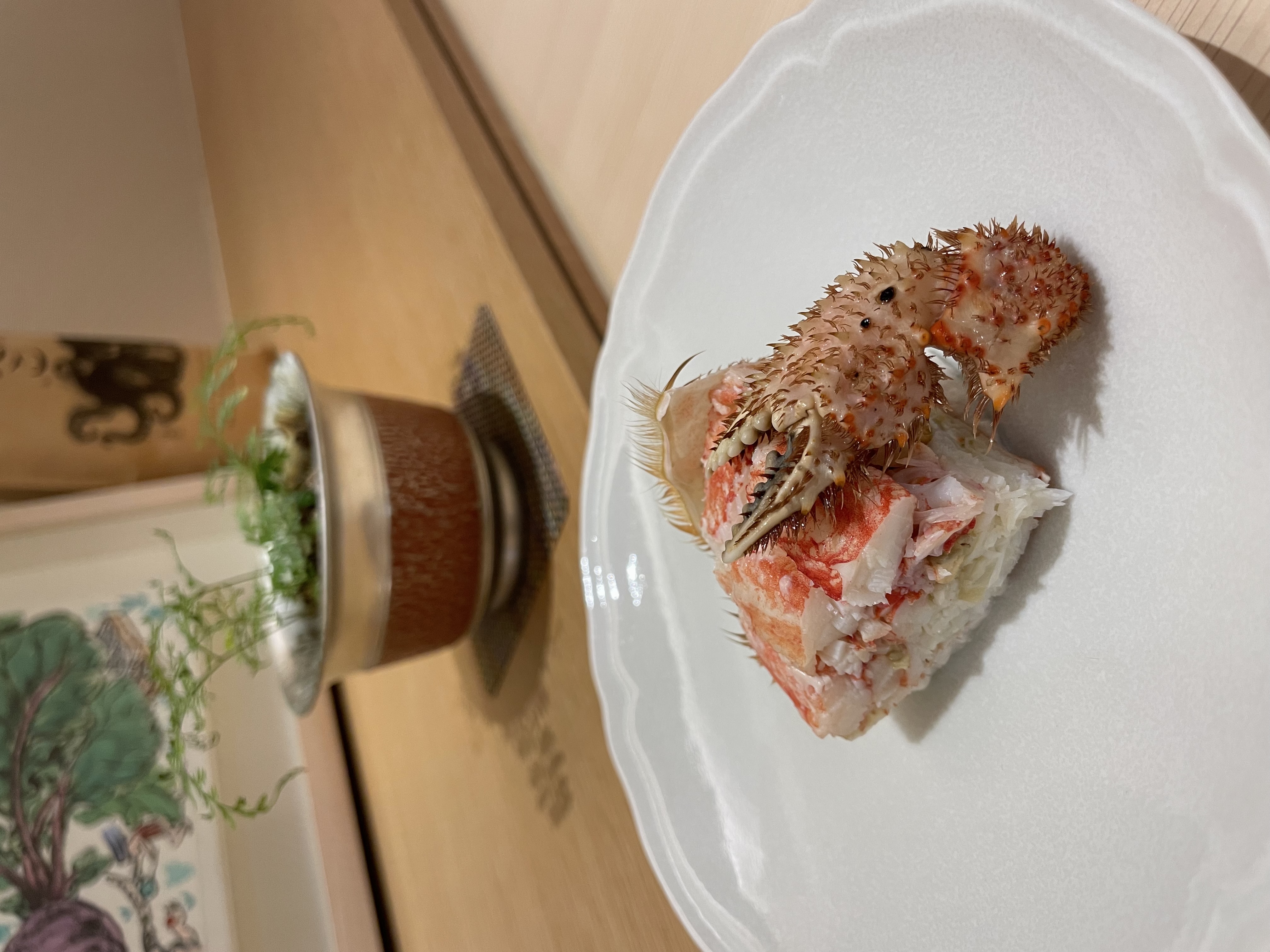 Sushi Toboshi omakase counter and chef plating nigiri