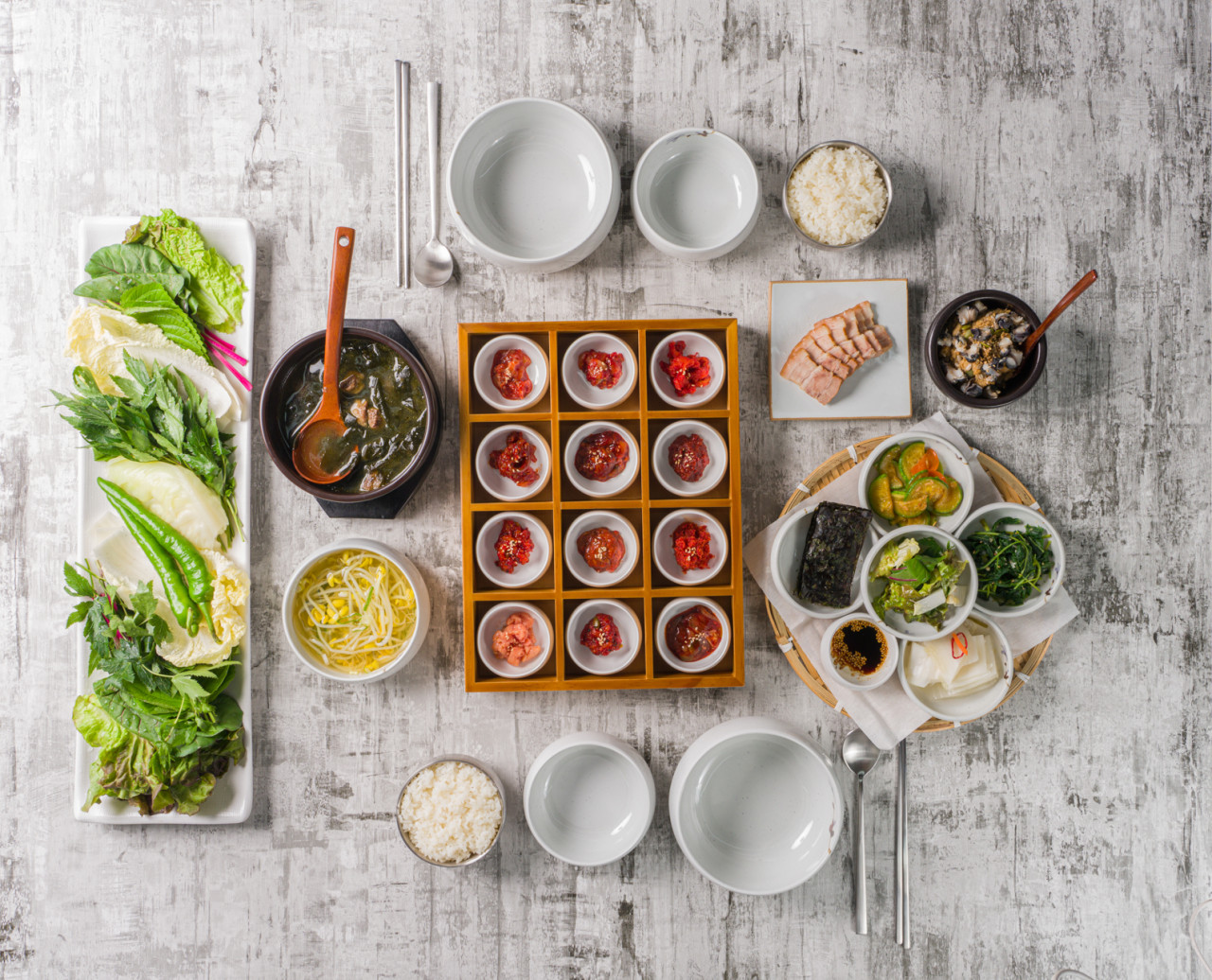 Hayanggorae Jonggak fermented seafood wraps and fresh greens