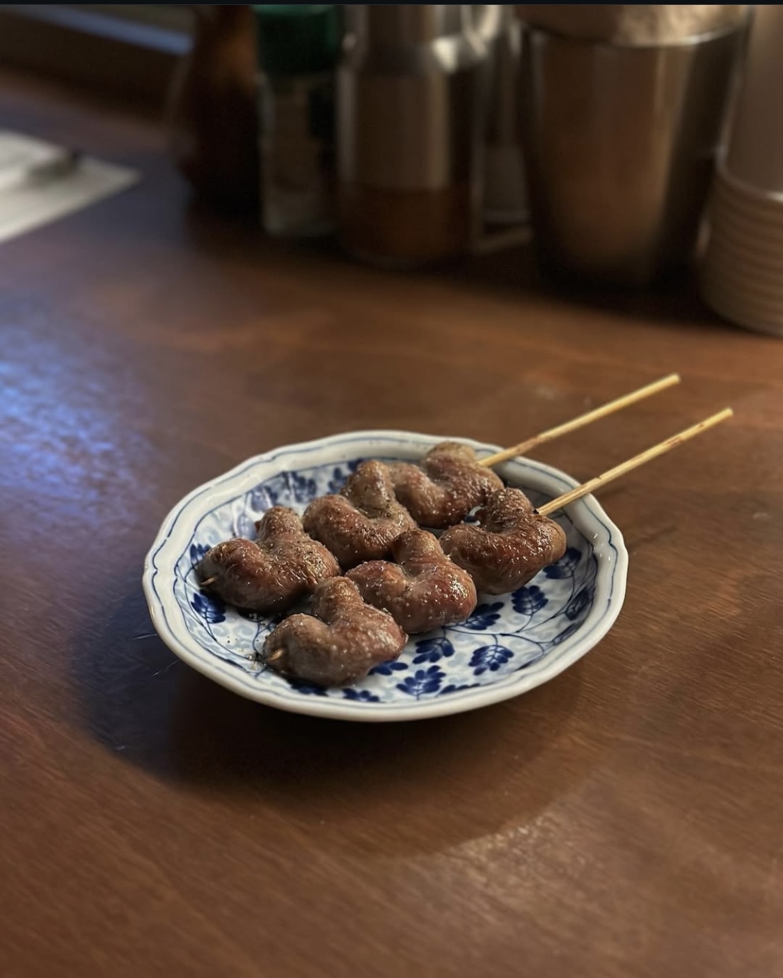 Kochi Seongsu yakitori skewers over glowing charcoal