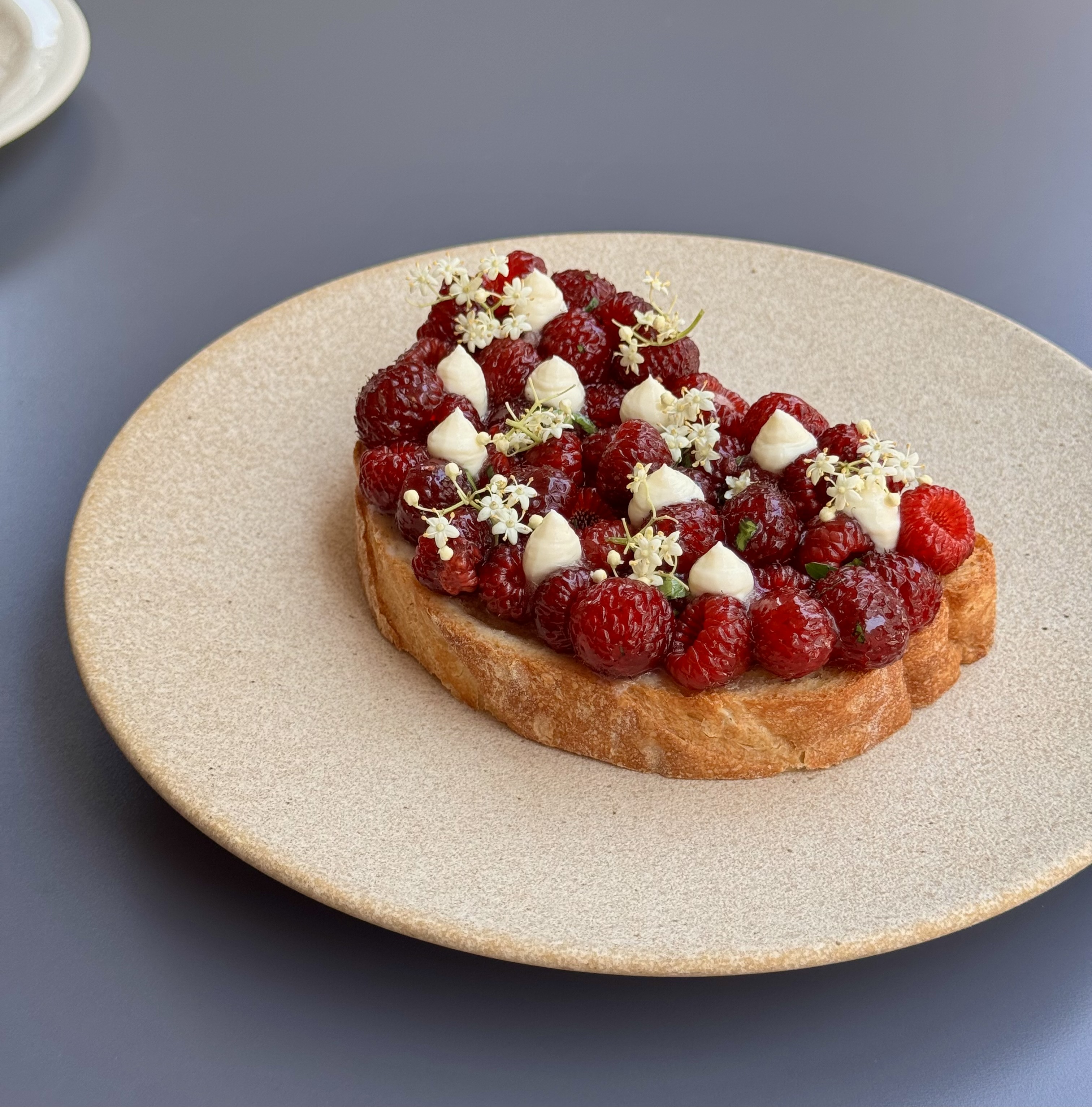 Frater Sindang cozy red-brick dining room with pasta