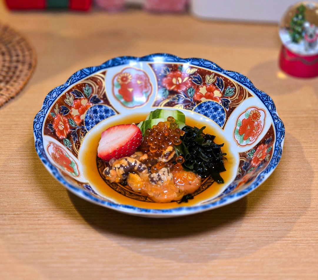 Aruhi Nana izakaya counter with skewers and sake