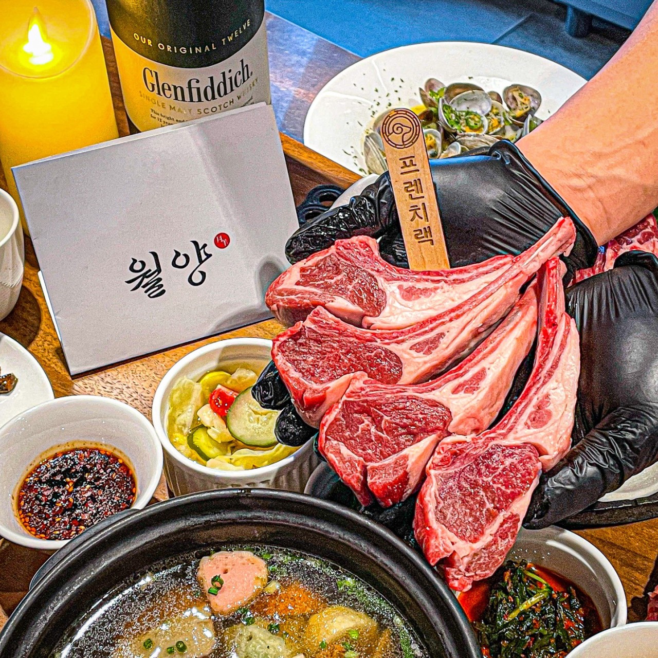 Wol Yang premium lamb chops grilling over charcoal