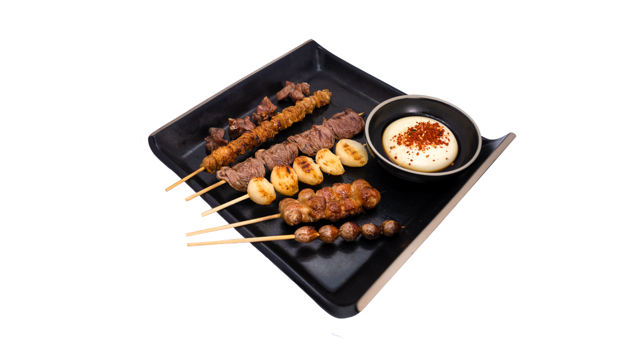 KUSHI152 binchotan yakitori skewers at the counter