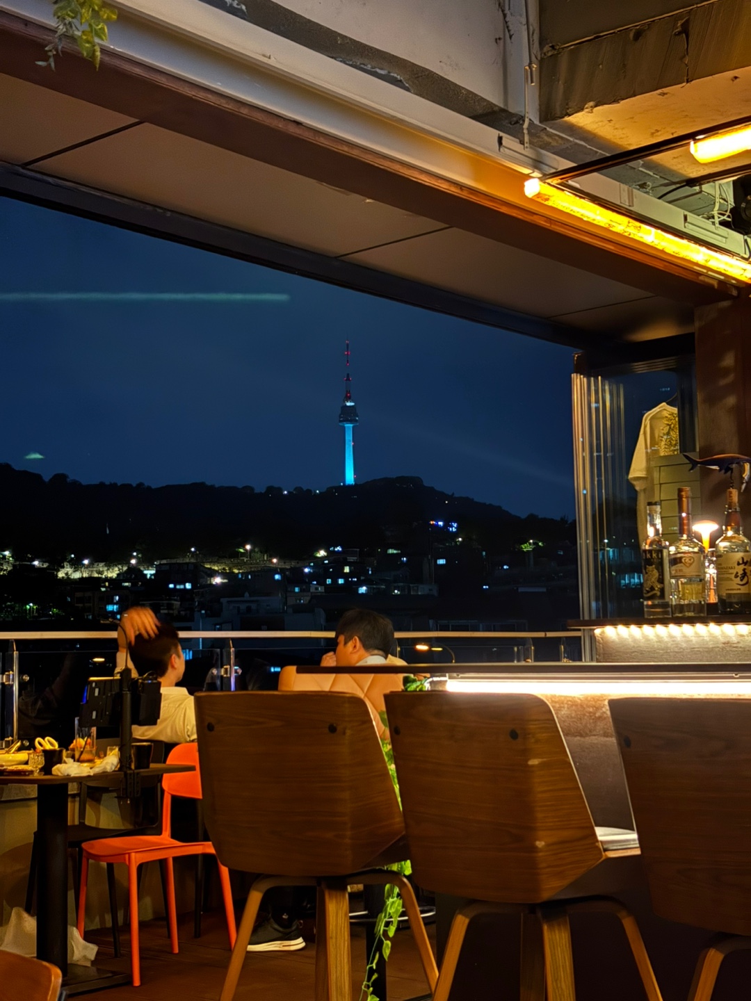 Wooyajae rooftop view of Namsan with small plates and sool